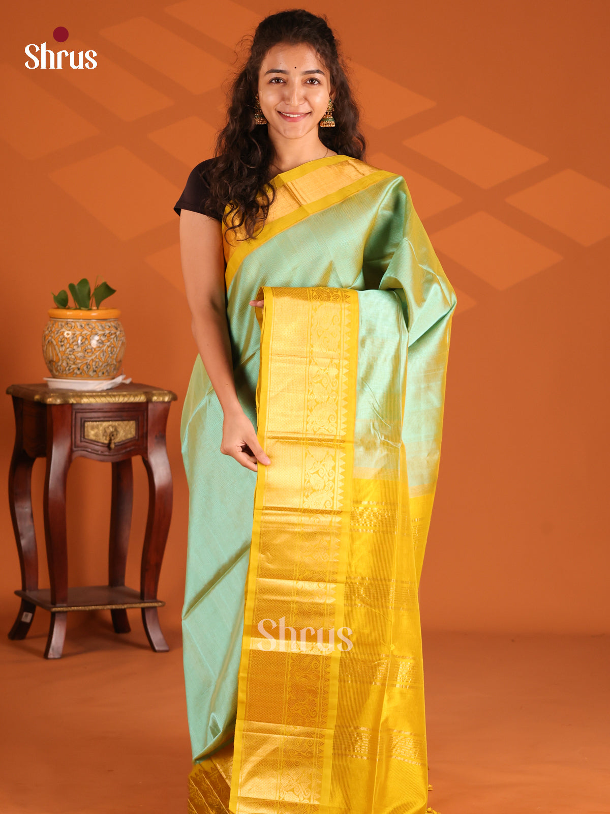 Gorgeous Pista green Silk Cotton Saree with peacock floral vines in Yellow zari border - Shop on Shrus.com