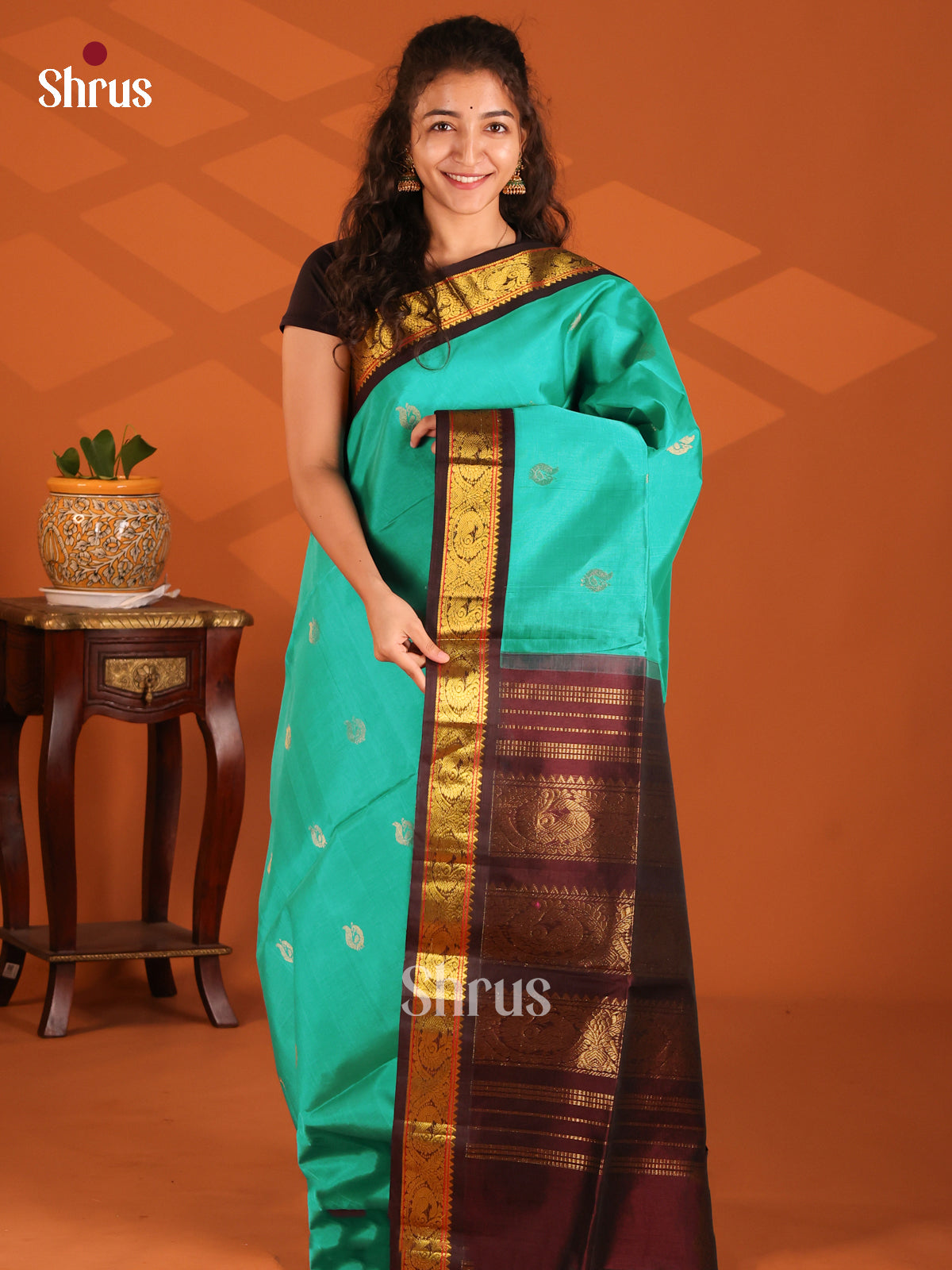 Elegant Teal Silk Cotton Saree with gold zari floral buttas & brown zari border - Shop on Shrus.com