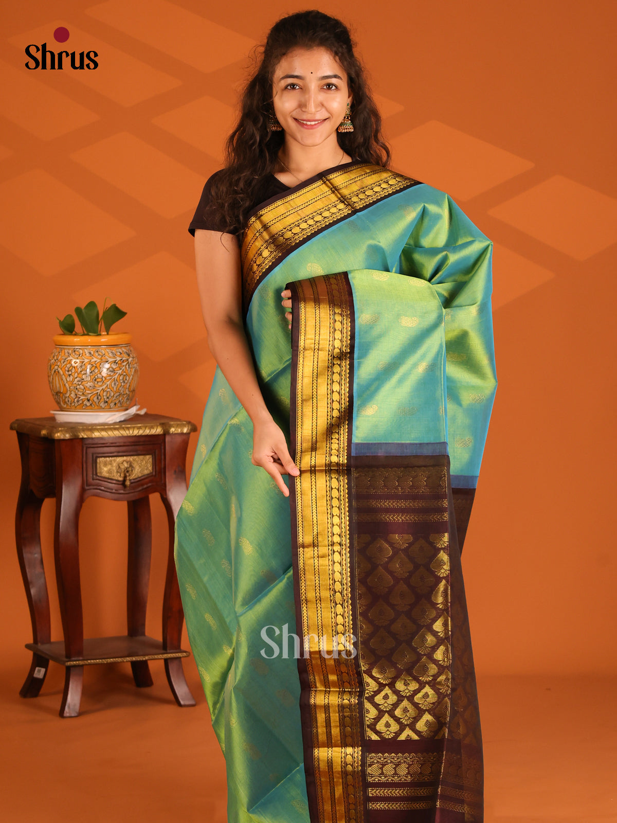 Shimmery Green Silk Cotton Saree with zari buttas , brown floral brocade pallu - Shop on Shrus.com