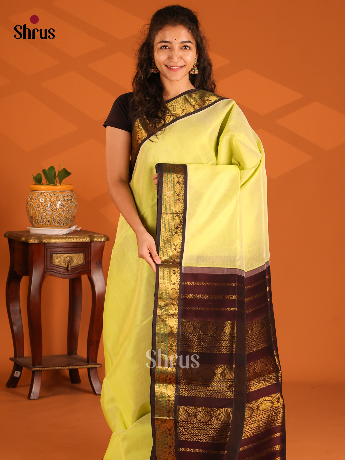 Beautiful Lite Green Silk Cotton Saree with rudraksh zari butta brown Border - Shop on Shrus.com