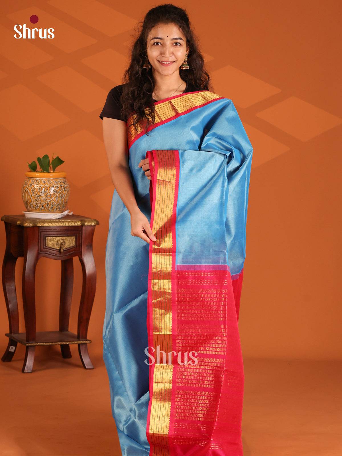 Vivacious Blue Silk Cotton Saree with  contrast Red Zari striped Pallu