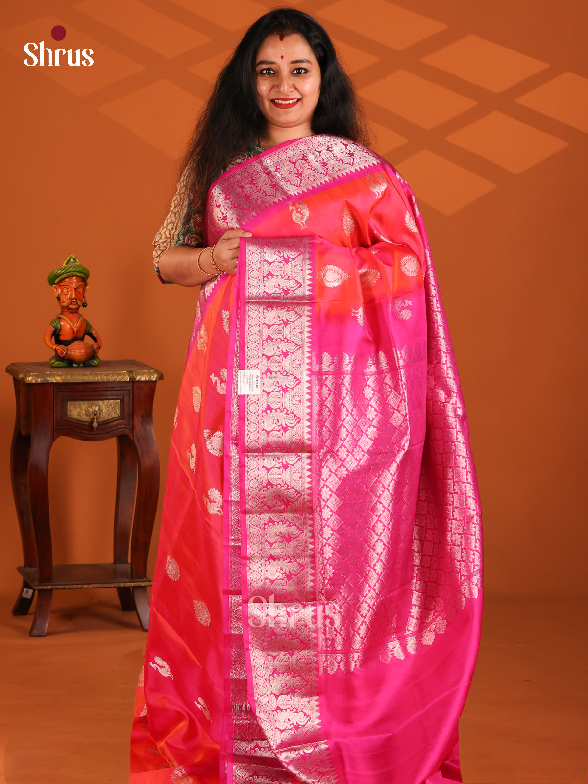 Radiant Orangish Pink  Venkatagiri silk Saree gleams with floral , peacock buttis, contrast pink Border - Shop on Shrus.com