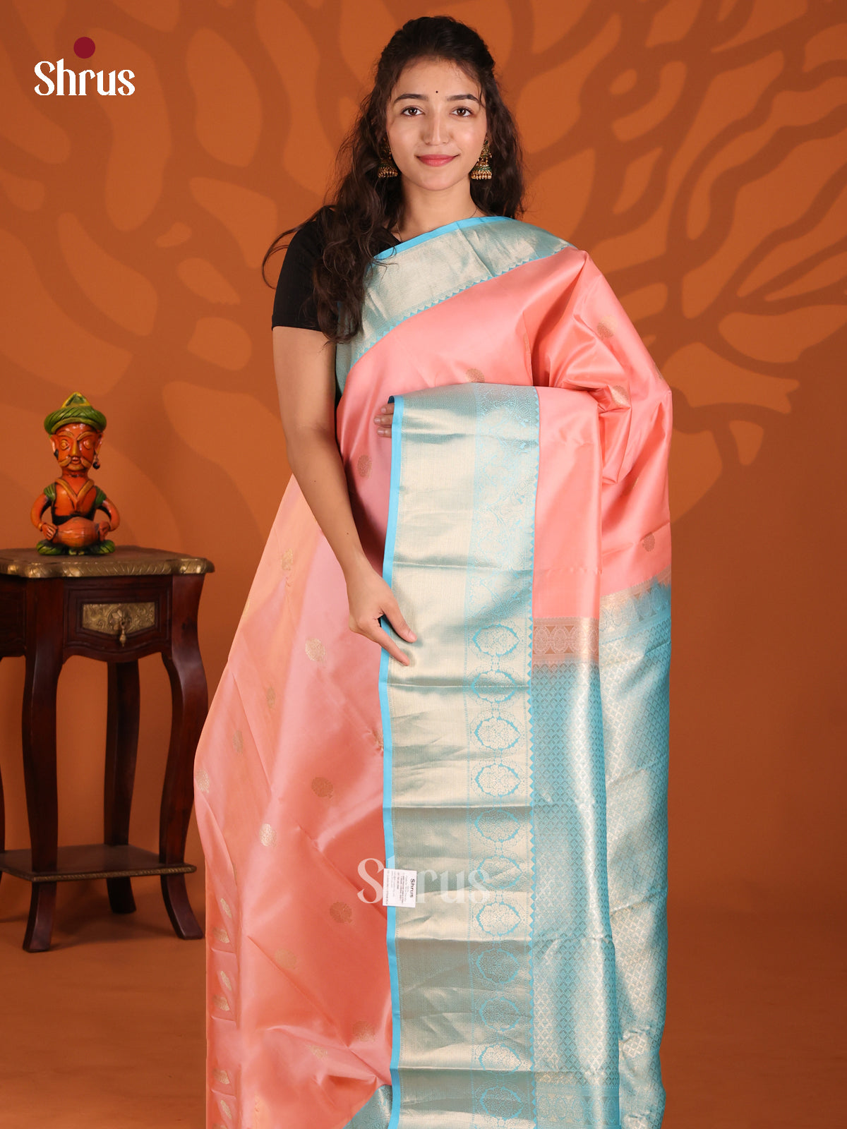 Peachish Pink  & Pastel Blue Kanchipuram silk Saree with intricate zari floral buttas