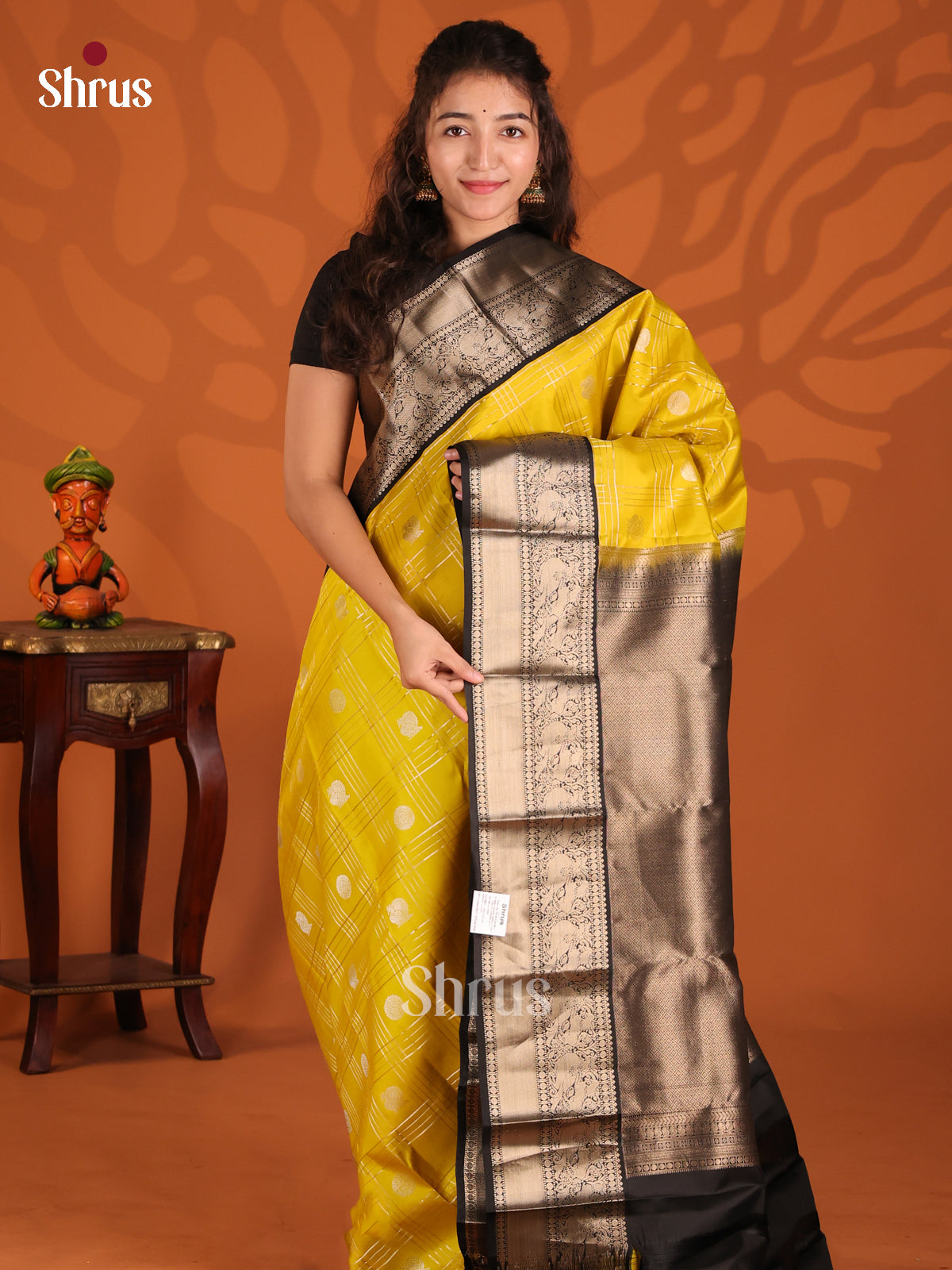 Yellow & Black Kanchipuram silk Saree  with silver zari peacock & floral buttas - Shop on Shrus.com