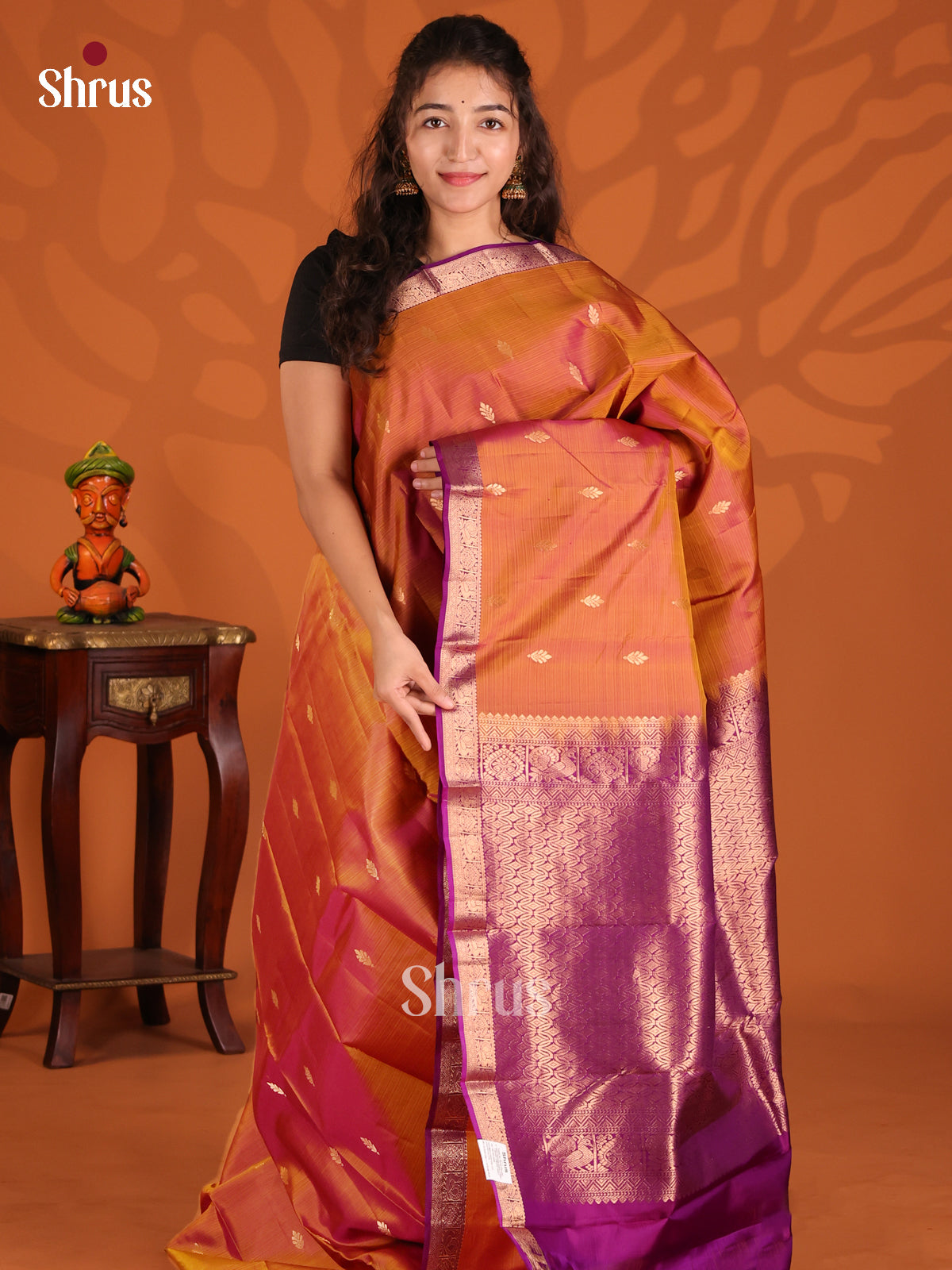 Chic Rust and Vadamalli Kanchipuram silk Saree adorned with gold zari floral buttas