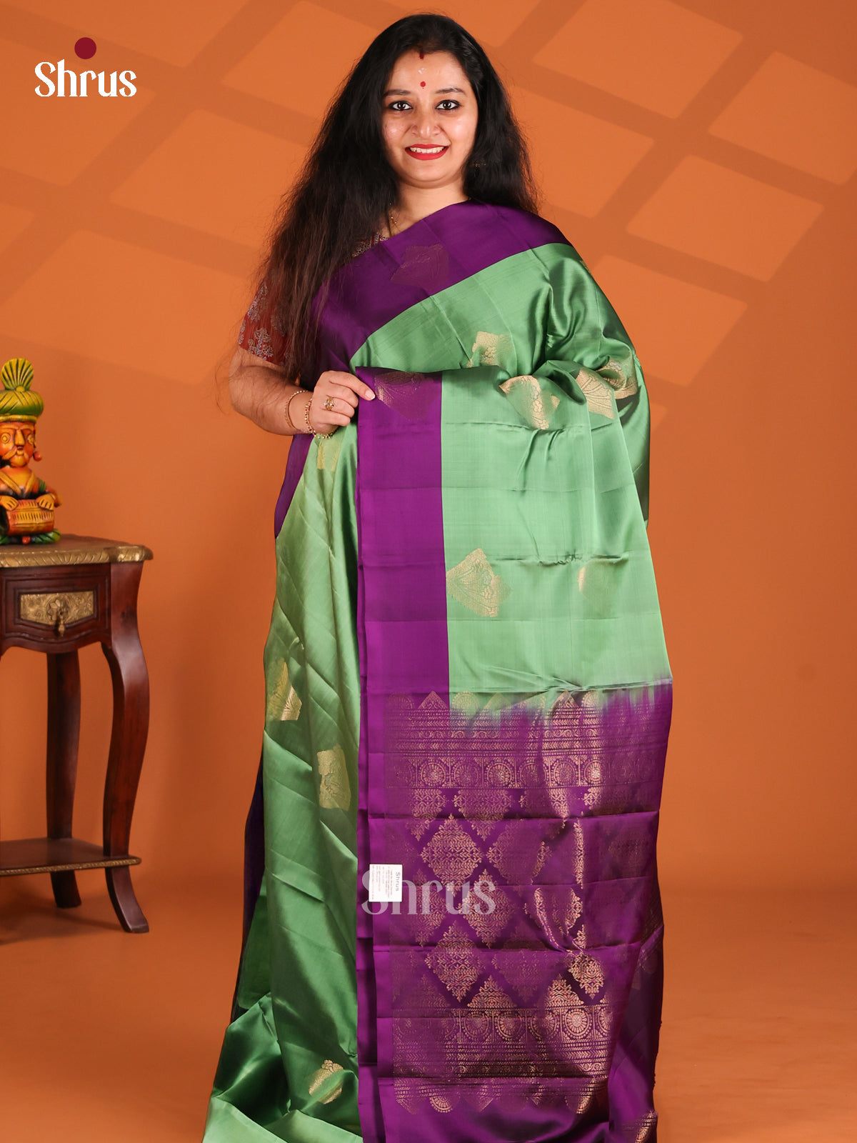 Serene Green  Softsilk-halfpure Saree with zari motifs , contrast  iolet brocade pallu - Shop on Shrus.com