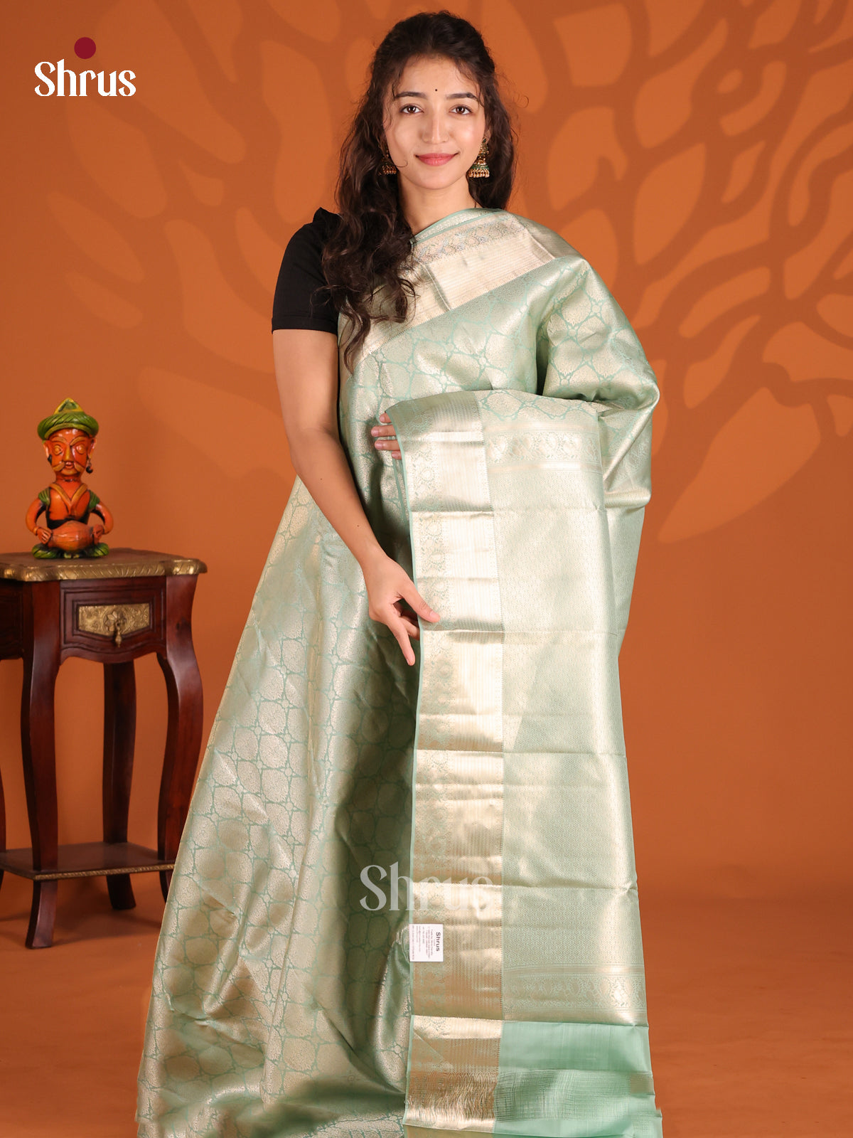 Pastel Green Kanchipuram silk Saree dazzles with zari woven floral brocade - Shop on Shrus.com