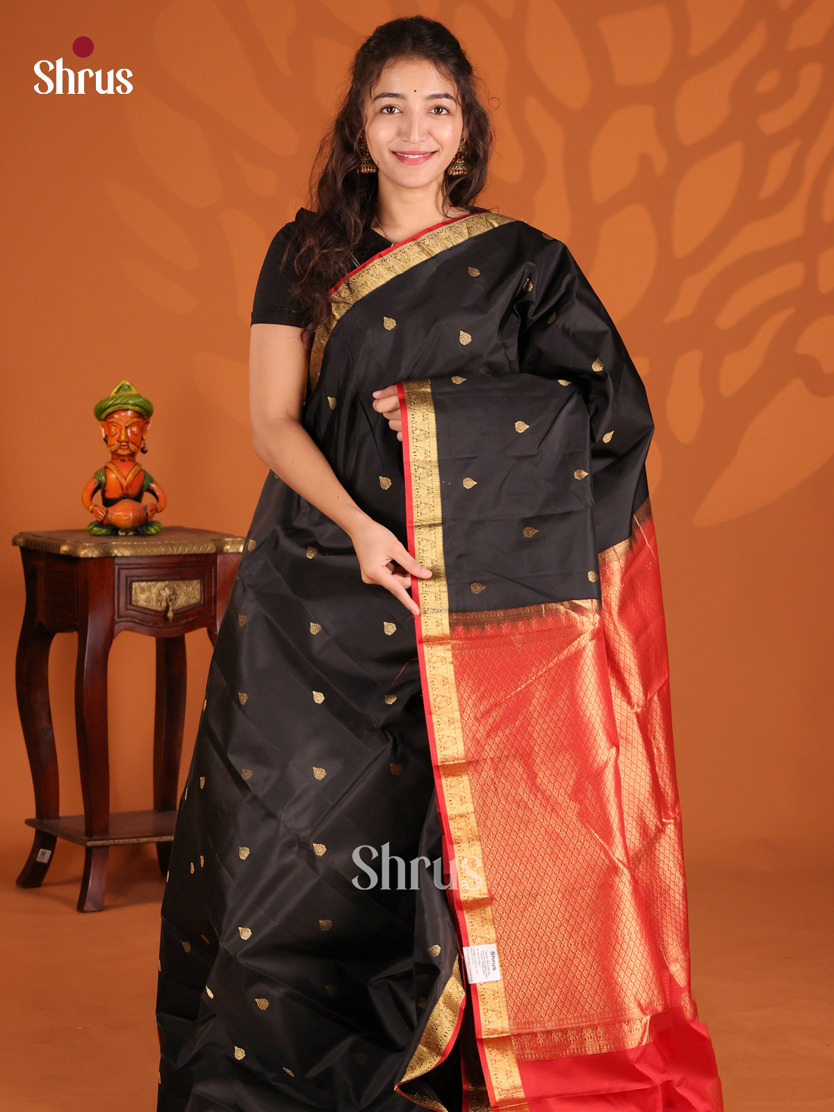 Black & Red Kanchipuram silk Saree with peacock & elephant zari butta border