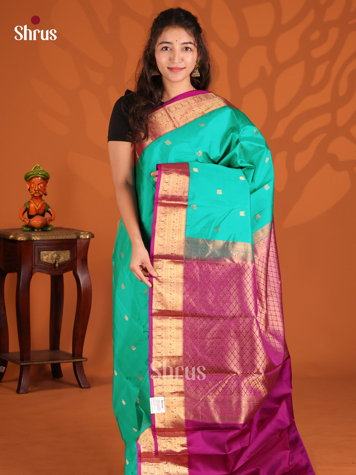 Teal & Purple Kanchipuram silk Saree with traditional peacock & elephant buttas-1