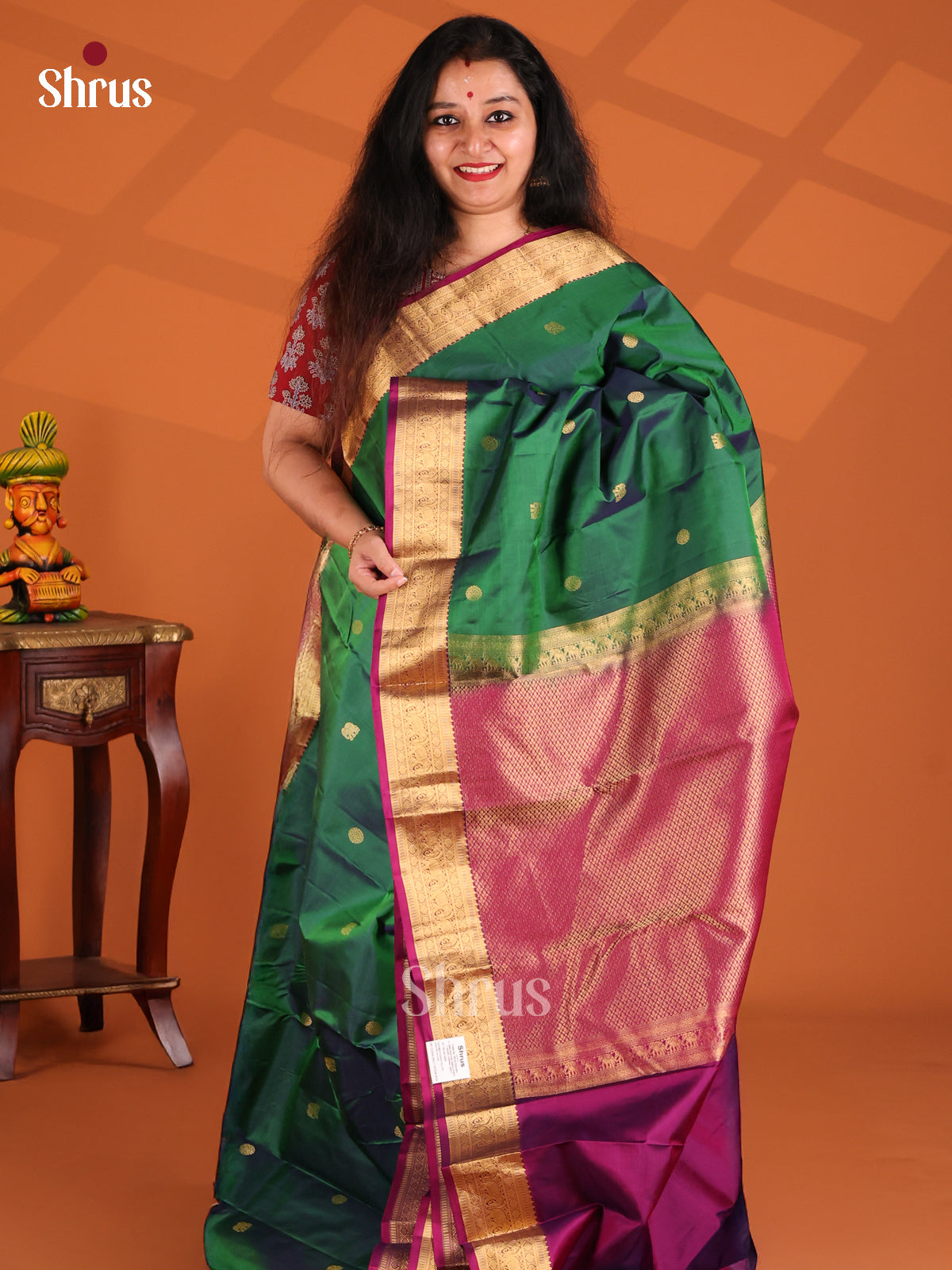 Serene Green Kanchipuram silk Saree with Purple zari elephant butta border - Shop on Shrus.com