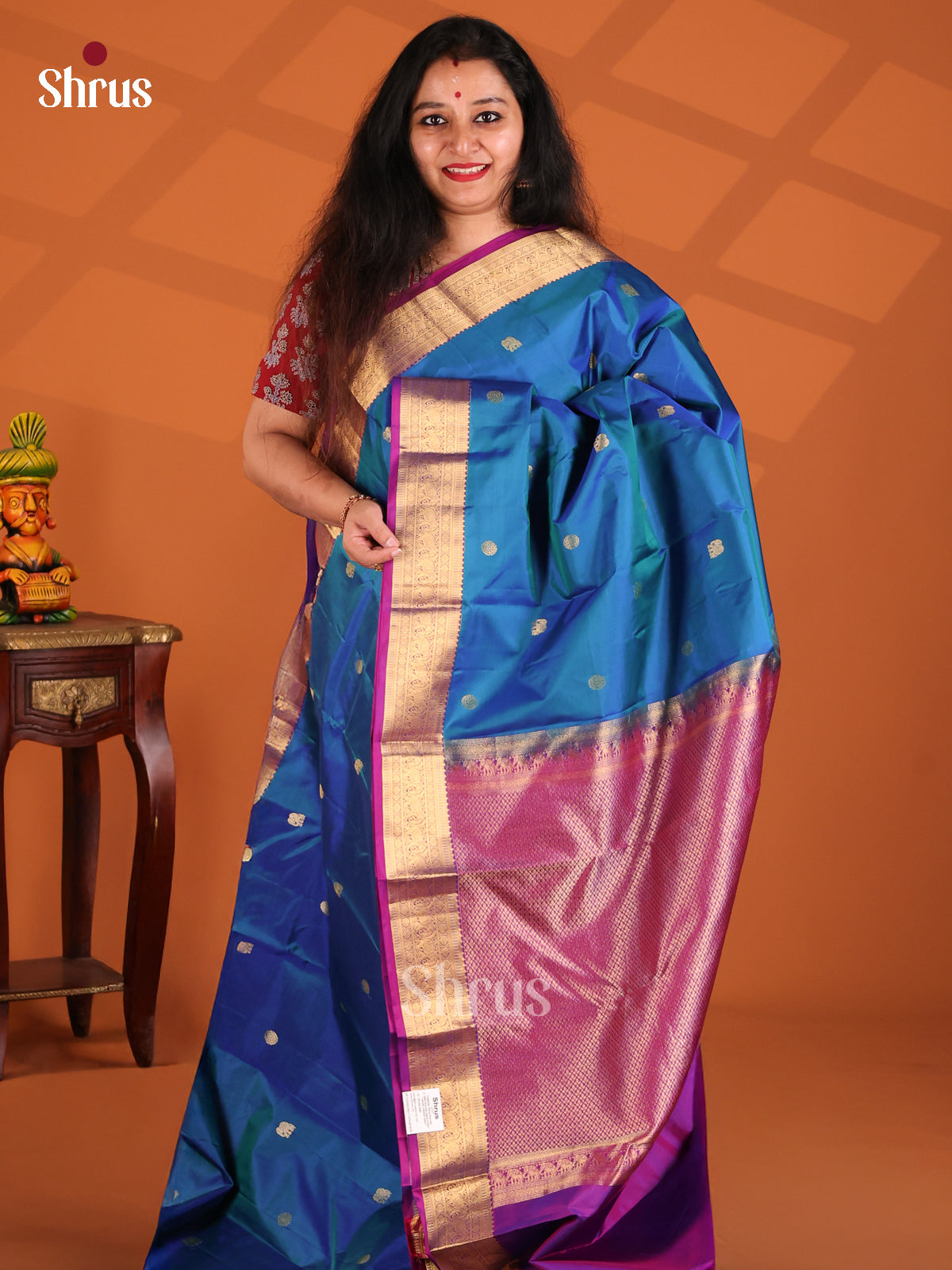 Vibrant Blue Kanchipuram SIlk Saree with purple elephant buttas zari border - Shop on Shrus.com
