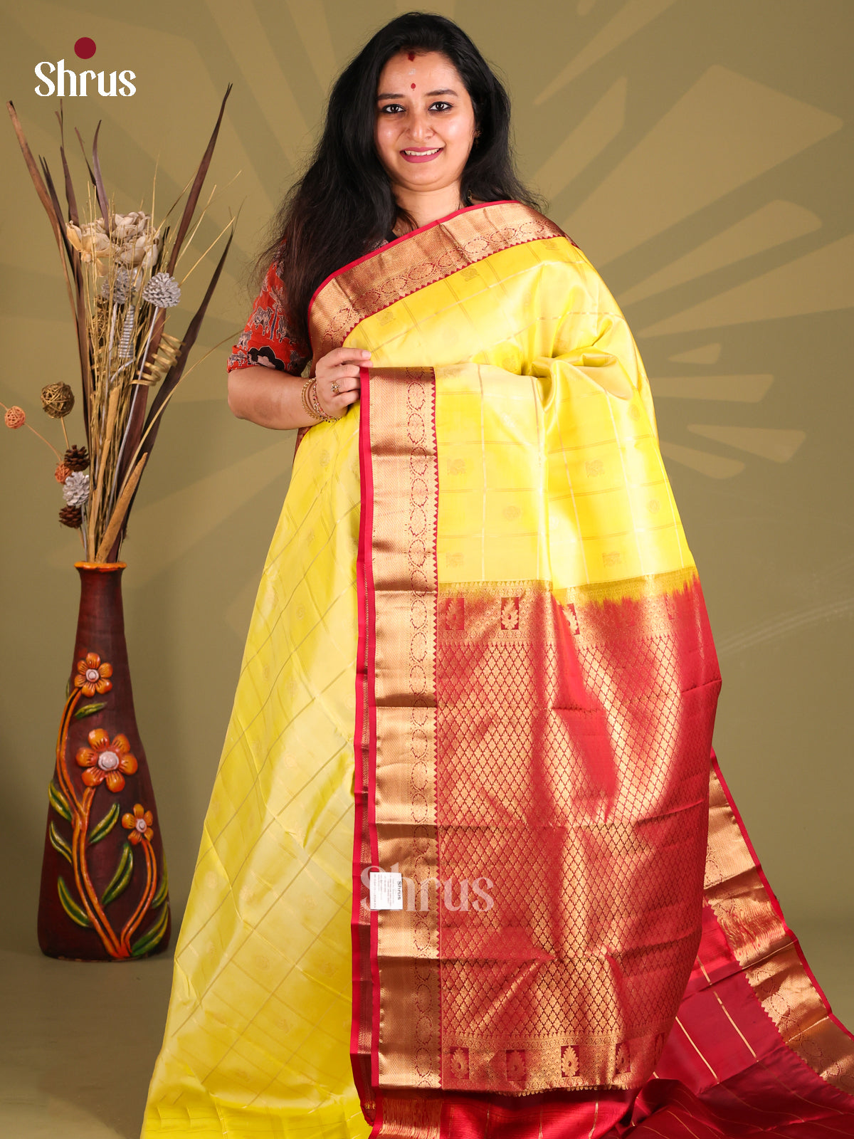 Glorious Lemon Yellow Kanchipuram silk Saree with zari checks , peacock buttas - Shop on Shrus.com