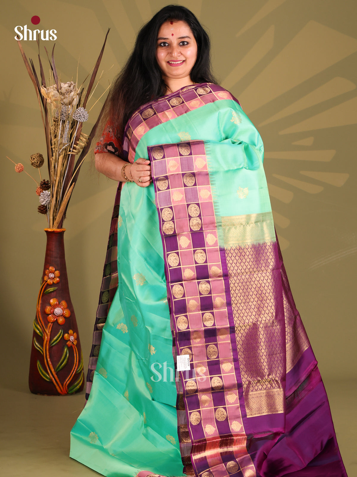 Teal Green & Purple Kanchipuram silk Saree gleams with zari floral buttas - Shop on Shrus.com
