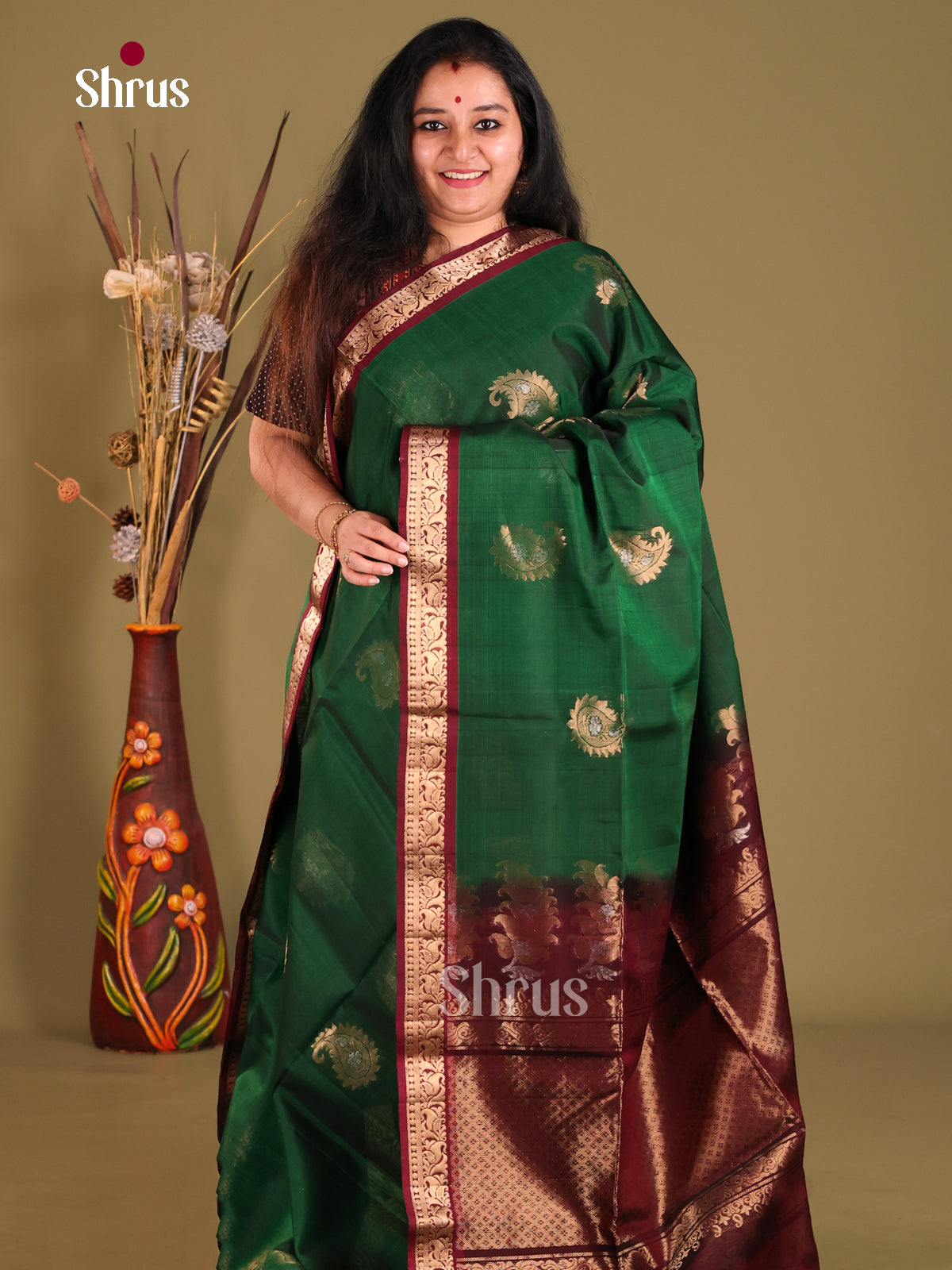 Green & Maroon  Silk Cotton Saree gleams with paisley zari motifs - Shop on Shrus.com