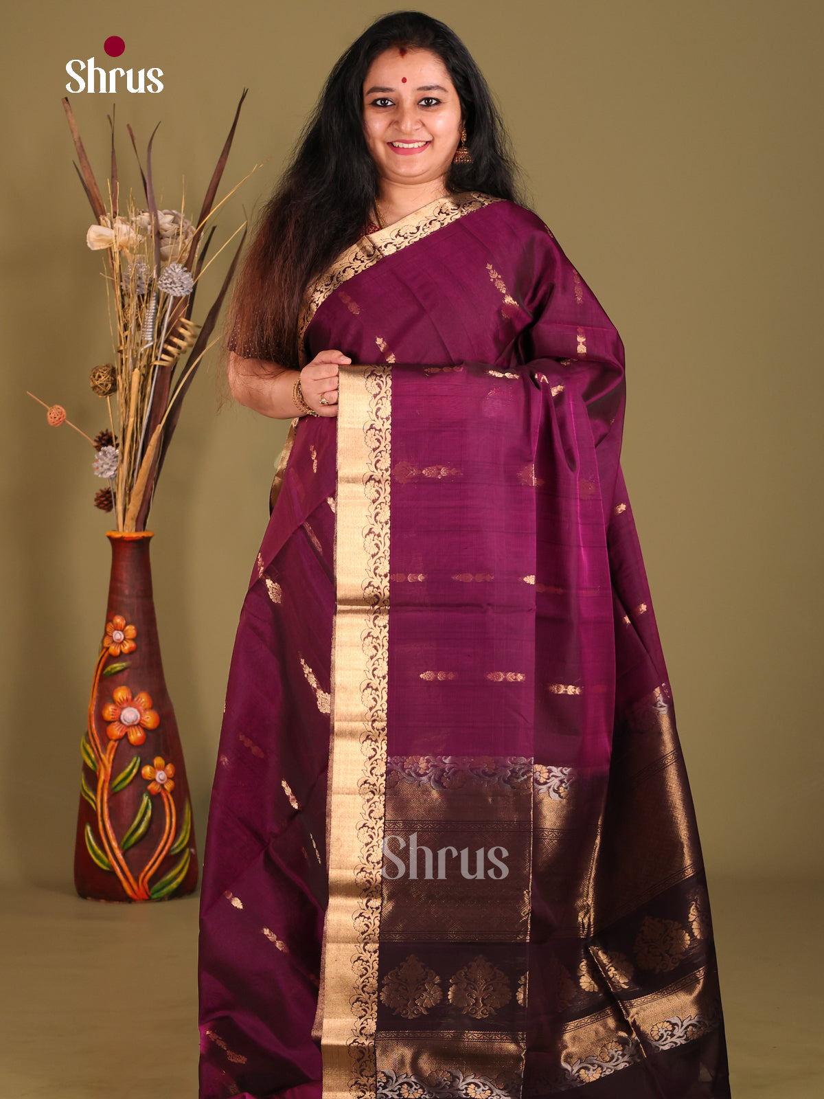 Wine & Maroon Silk Cotton Saree gleams with gold zari floral buttas - Shop on Shrus.com