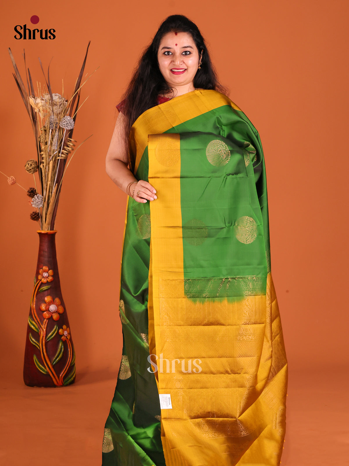 Green & Mustard Softsilk-halfpure Saree gleams with zari motifs - Shop on Shrus.com