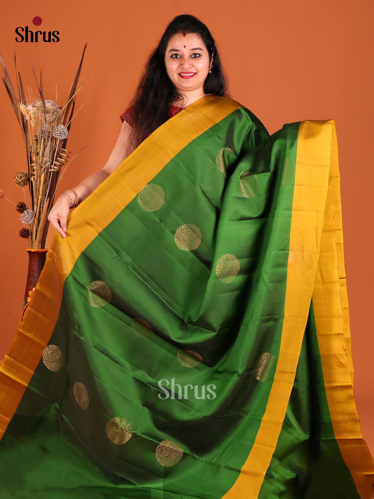 Green & Mustard Softsilk-halfpure Saree gleams with zari motifs - Shop on Shrus.com