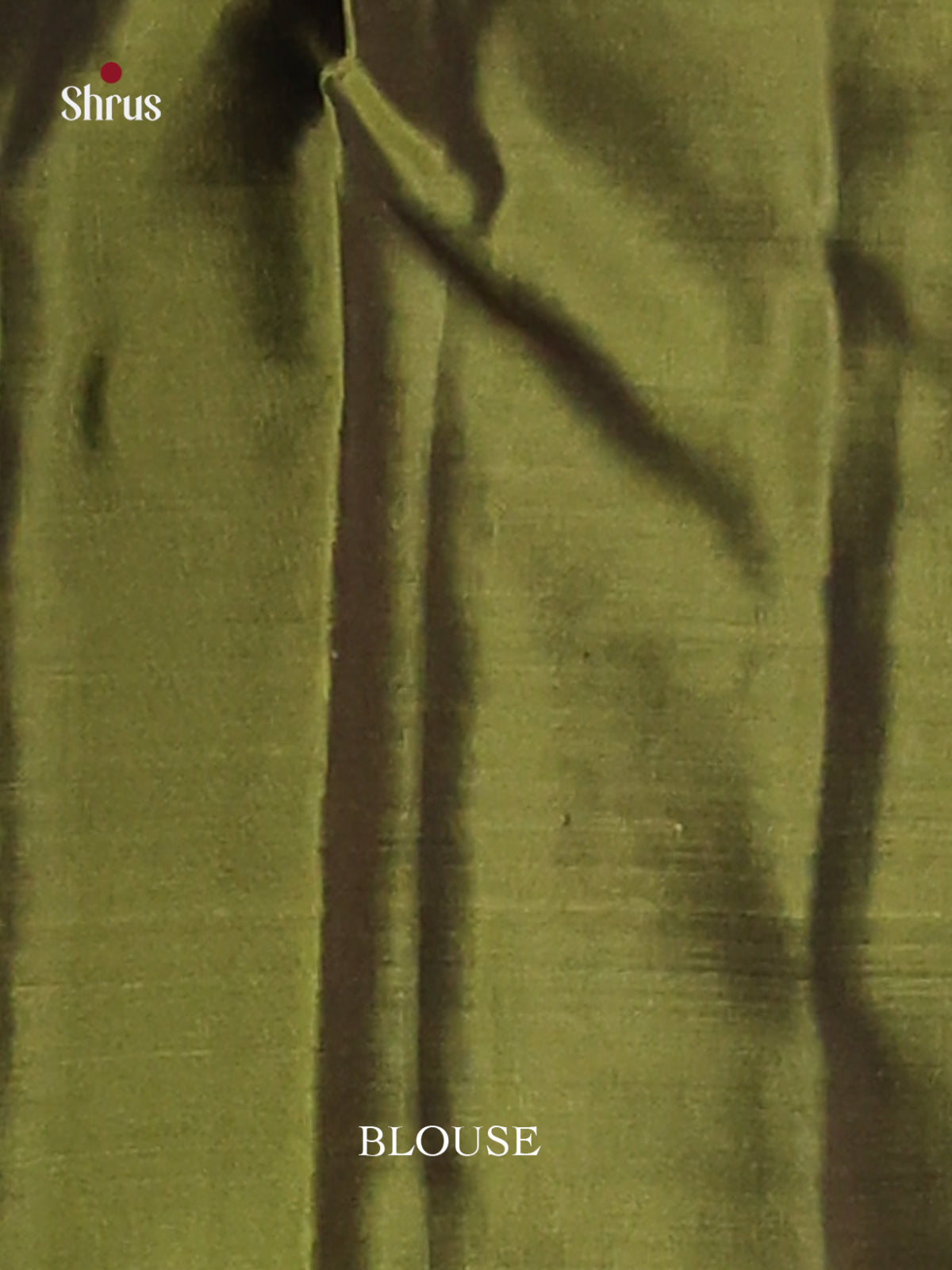 Purple & Green Softsilk-halfpure Saree gleams with zari floral motifs
