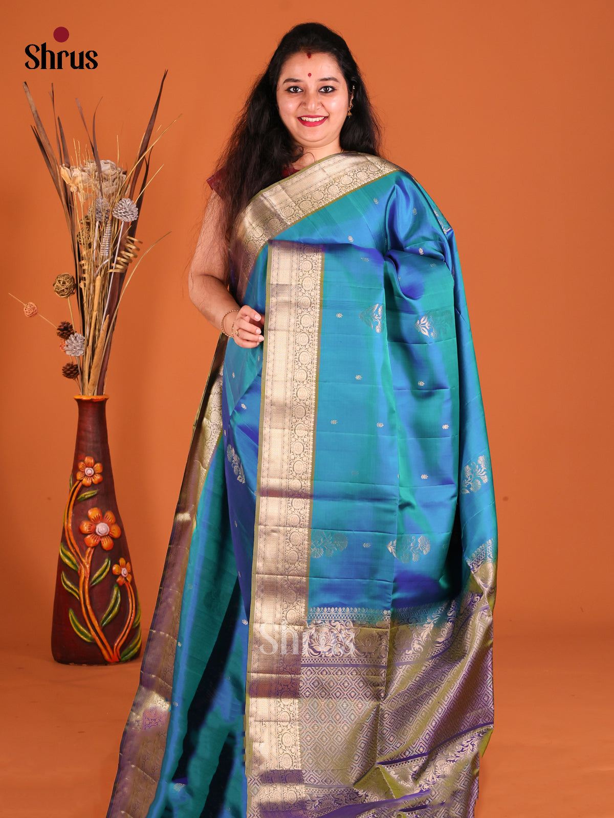 Blue & Purple Soft Silk Saree gleams witg gold zari buttas