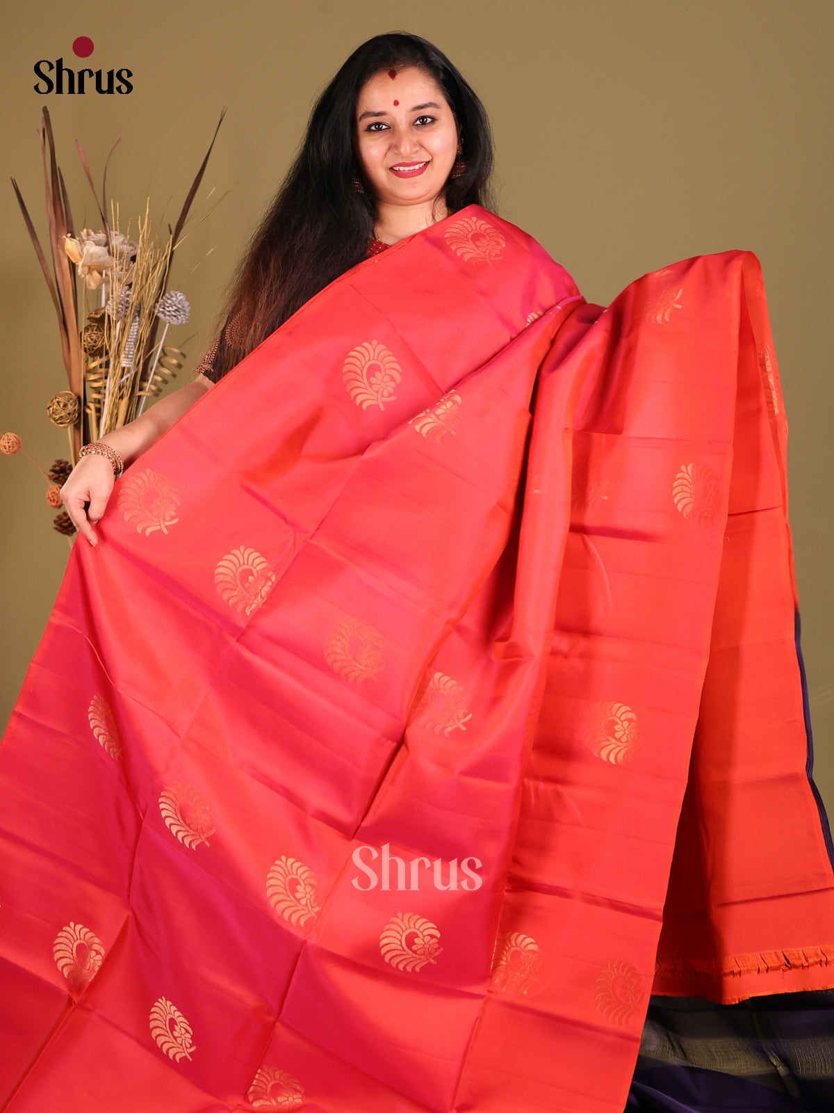 Orangish Pink & Blue Softsilk-halfpure Saree gleams with zari floral motifs - Shop on Shrus.com