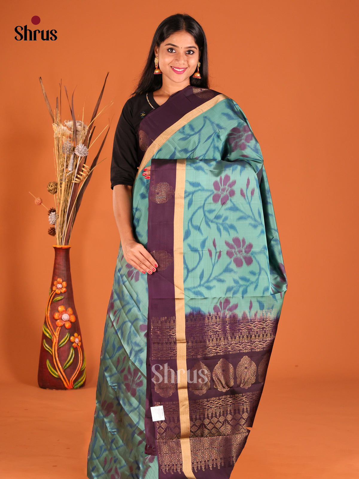 Blue & Jamun  Softsilk-halfpure Saree with ikkat floral motifs