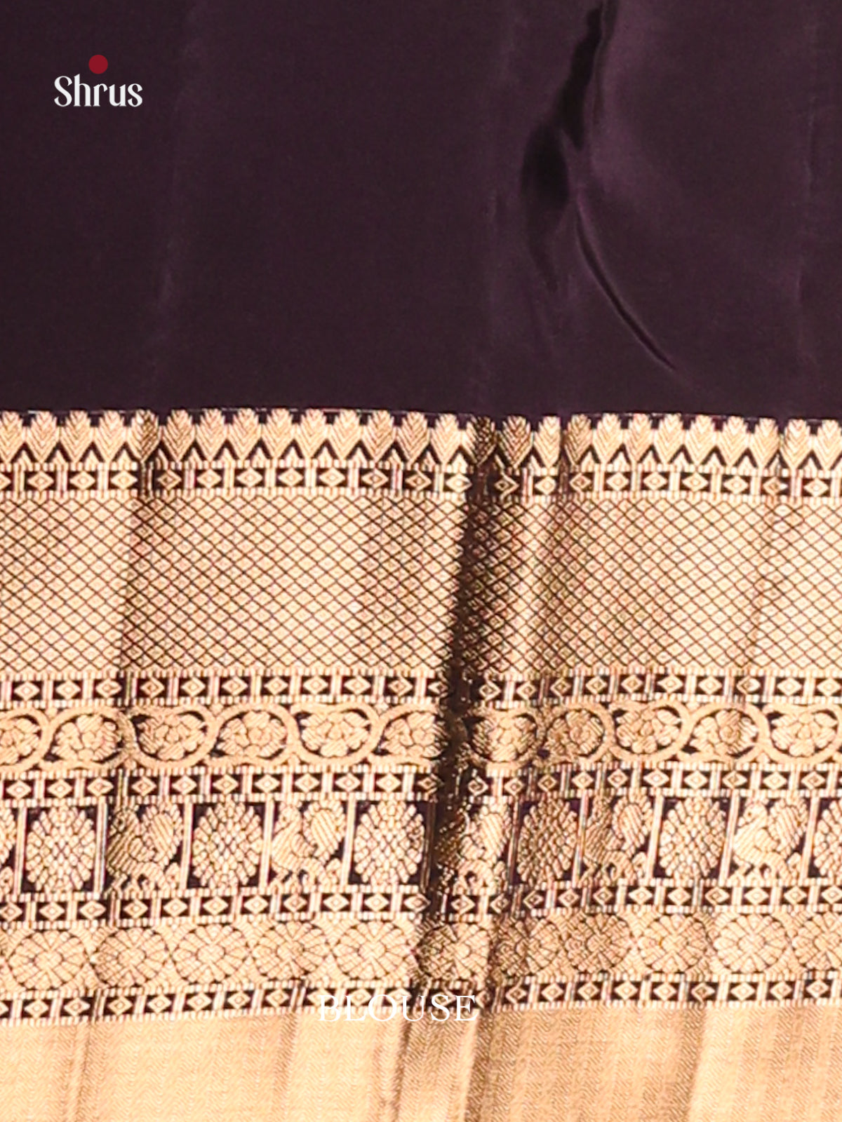 Brown & Violet Softsilk-halfpure Saree gleams with peacock zari buttas