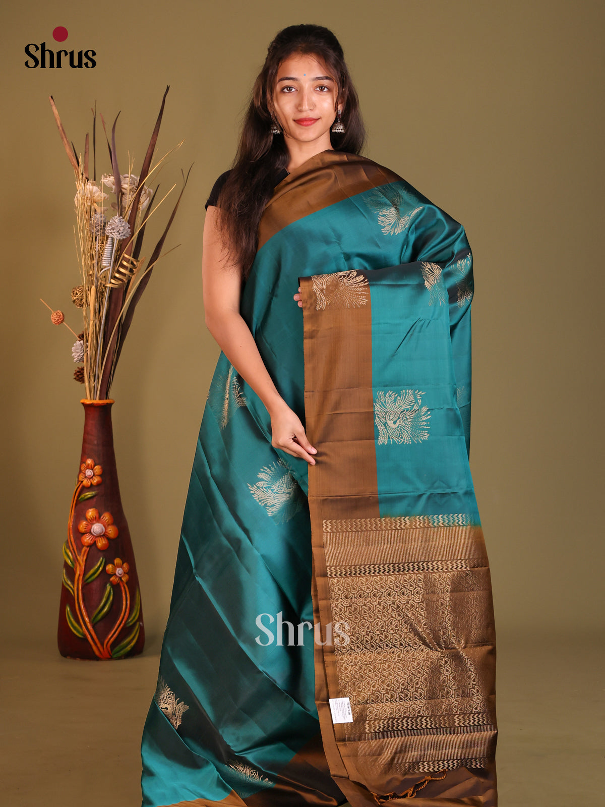 Blue & Brown Softsilk-halfpure Saree with zari floral motifs