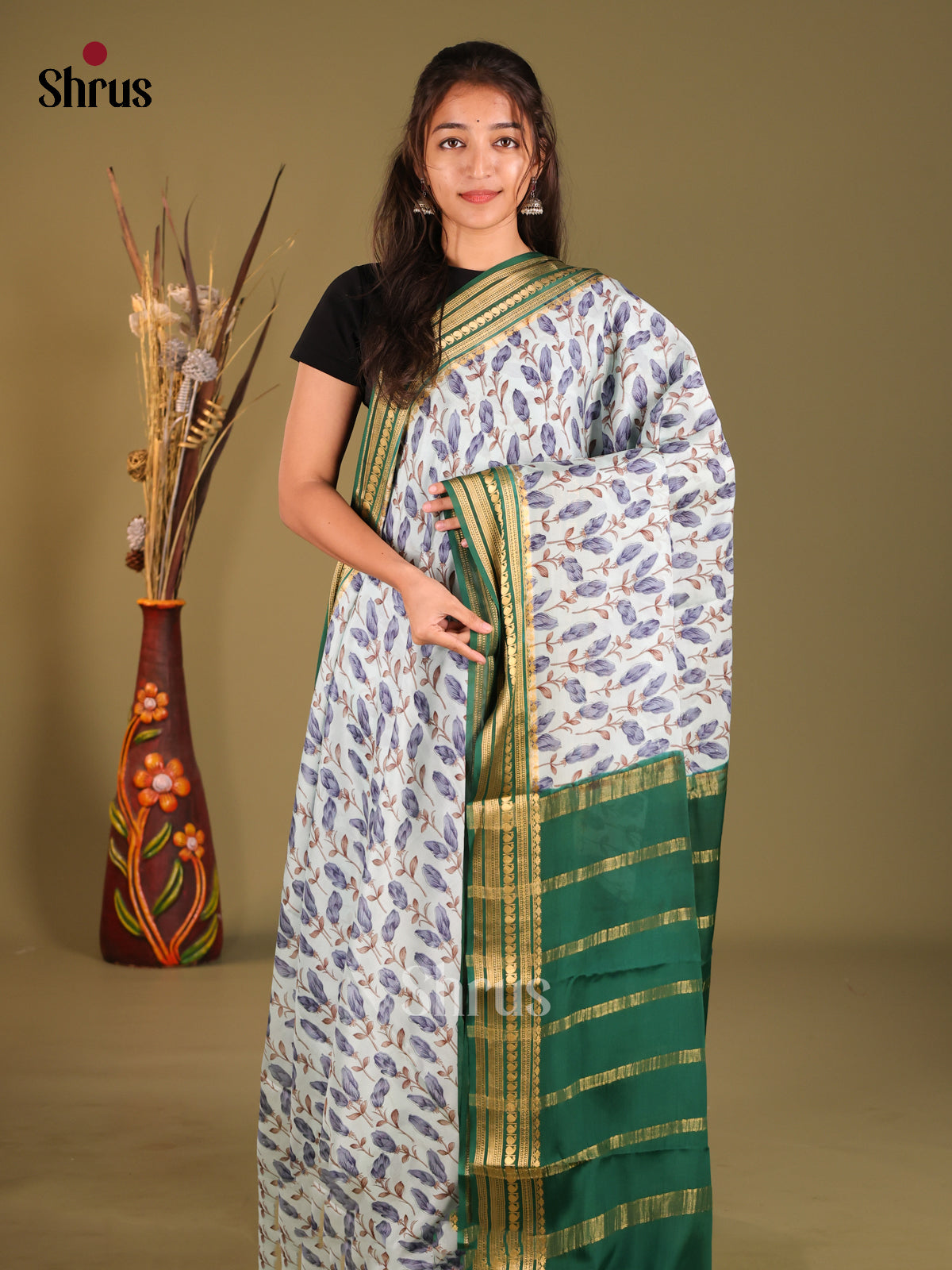 Charming Light Blue Printed Mysore Silk Saree With Green Zari Border