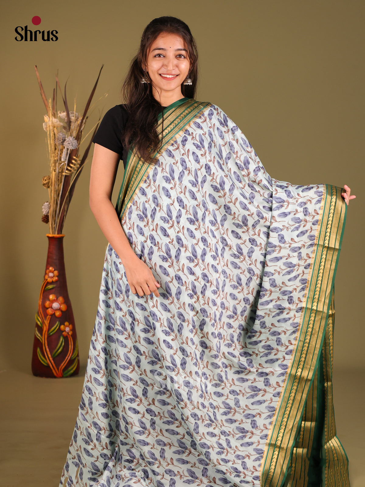 Charming Light Blue Printed Mysore Silk Saree With Green Zari Border