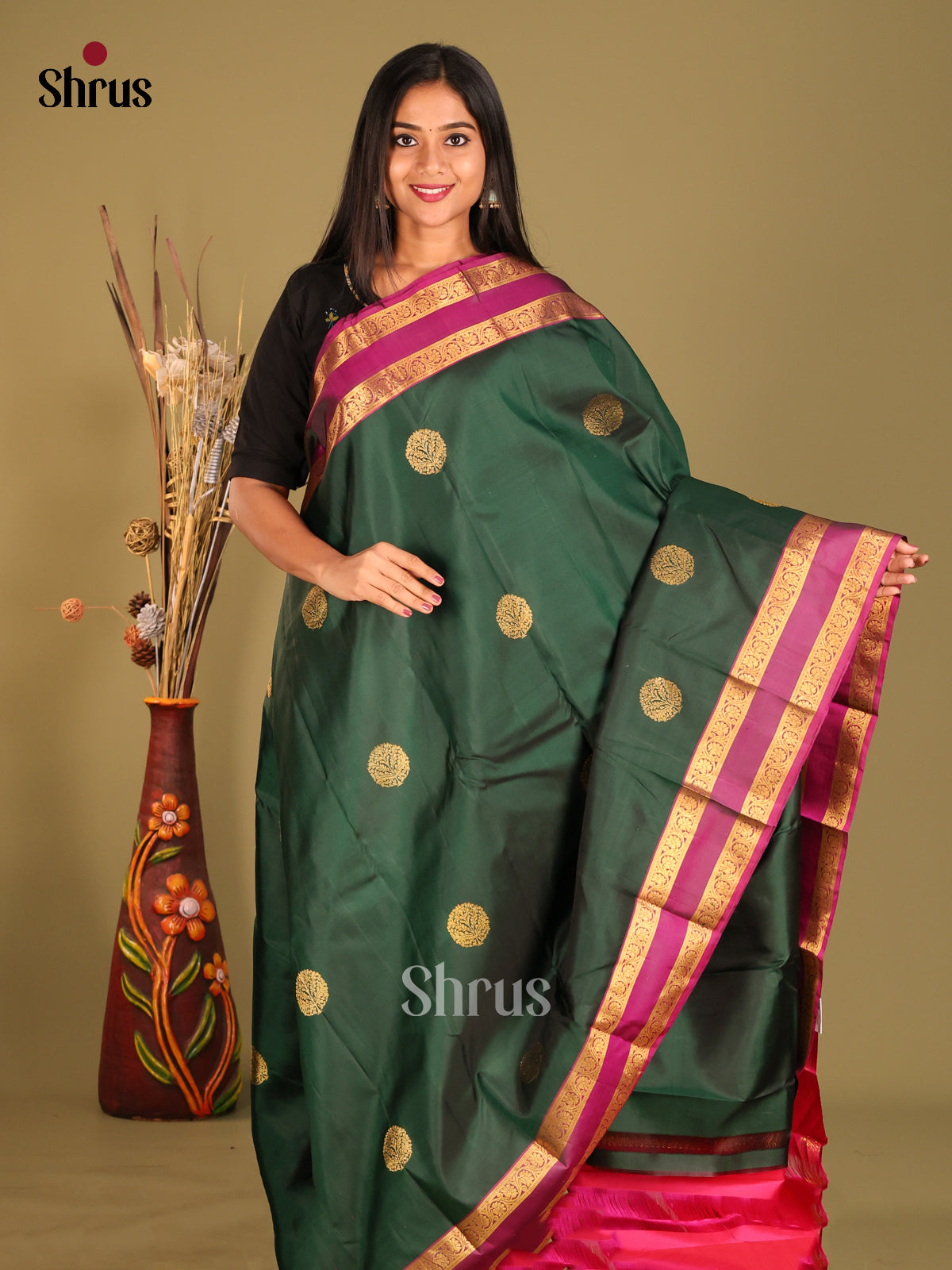 Ethereal Dark Green Kanjivaram Silk Saree with Zari Buttas & Pink Rettaipet border -1