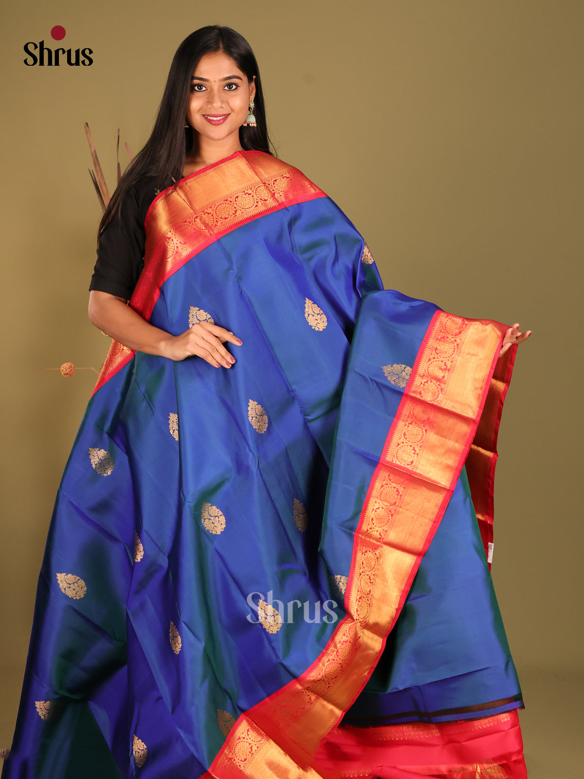 Vibrant Blue Kanchipuram Saree with thilagam motifs & Red Brocade Pallu