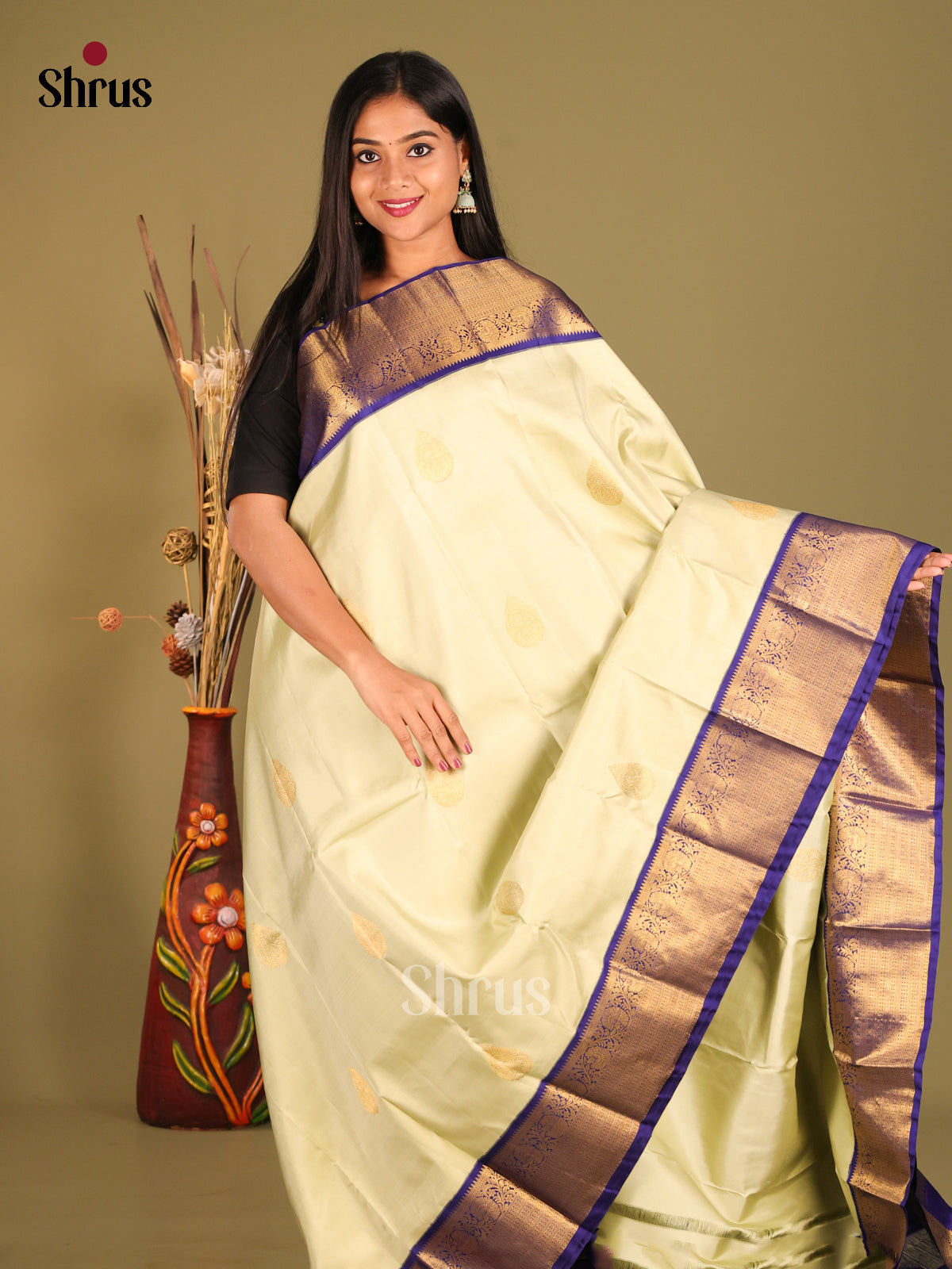 Regal Cream Kanchipuram Silk Saree with golden floral buttas & Blue Brocade Pallu -1