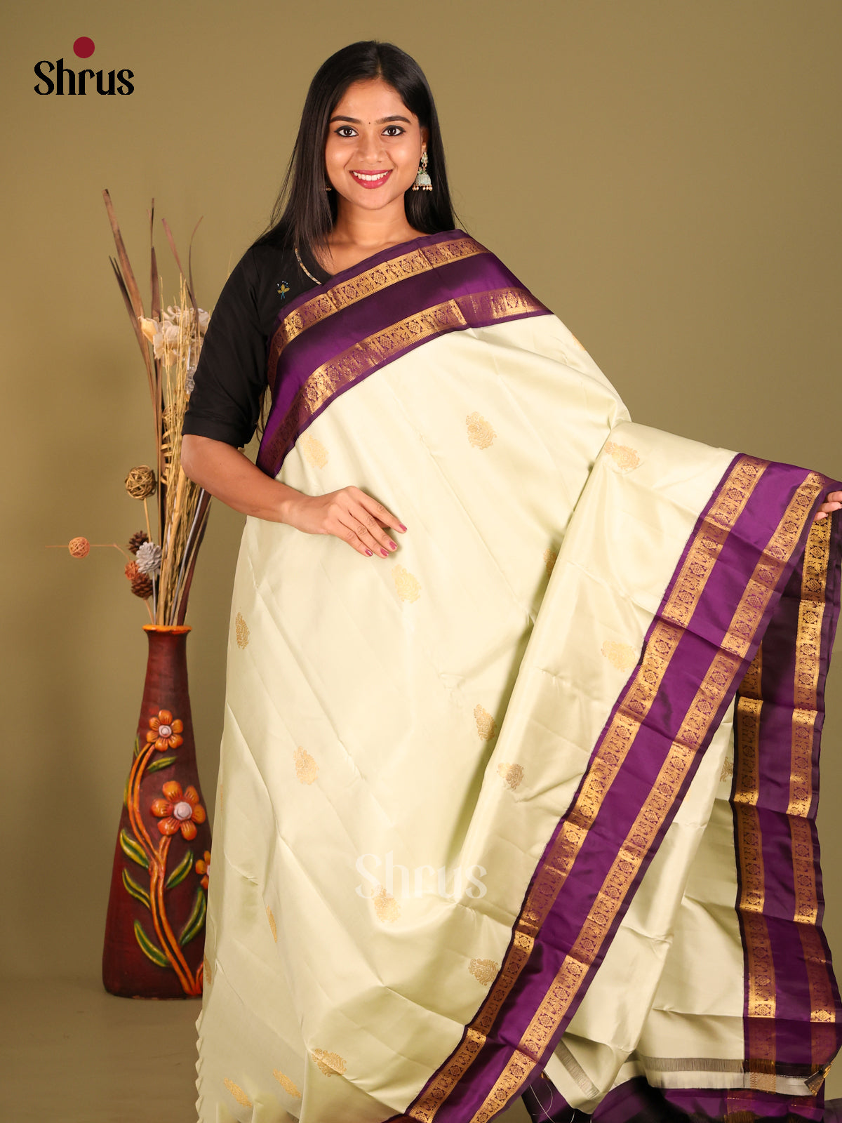 Glistening Cream Kanchipuram Saree with Zari Buttas & Purple Rettaipet zari border -1