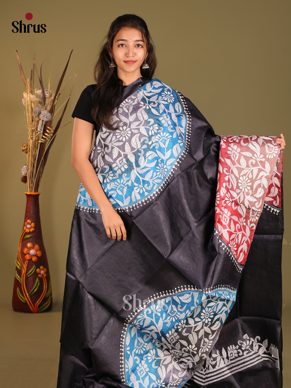 Elegant Black Tussar Silk Saree with Red Pallu and Artistic Motifs
