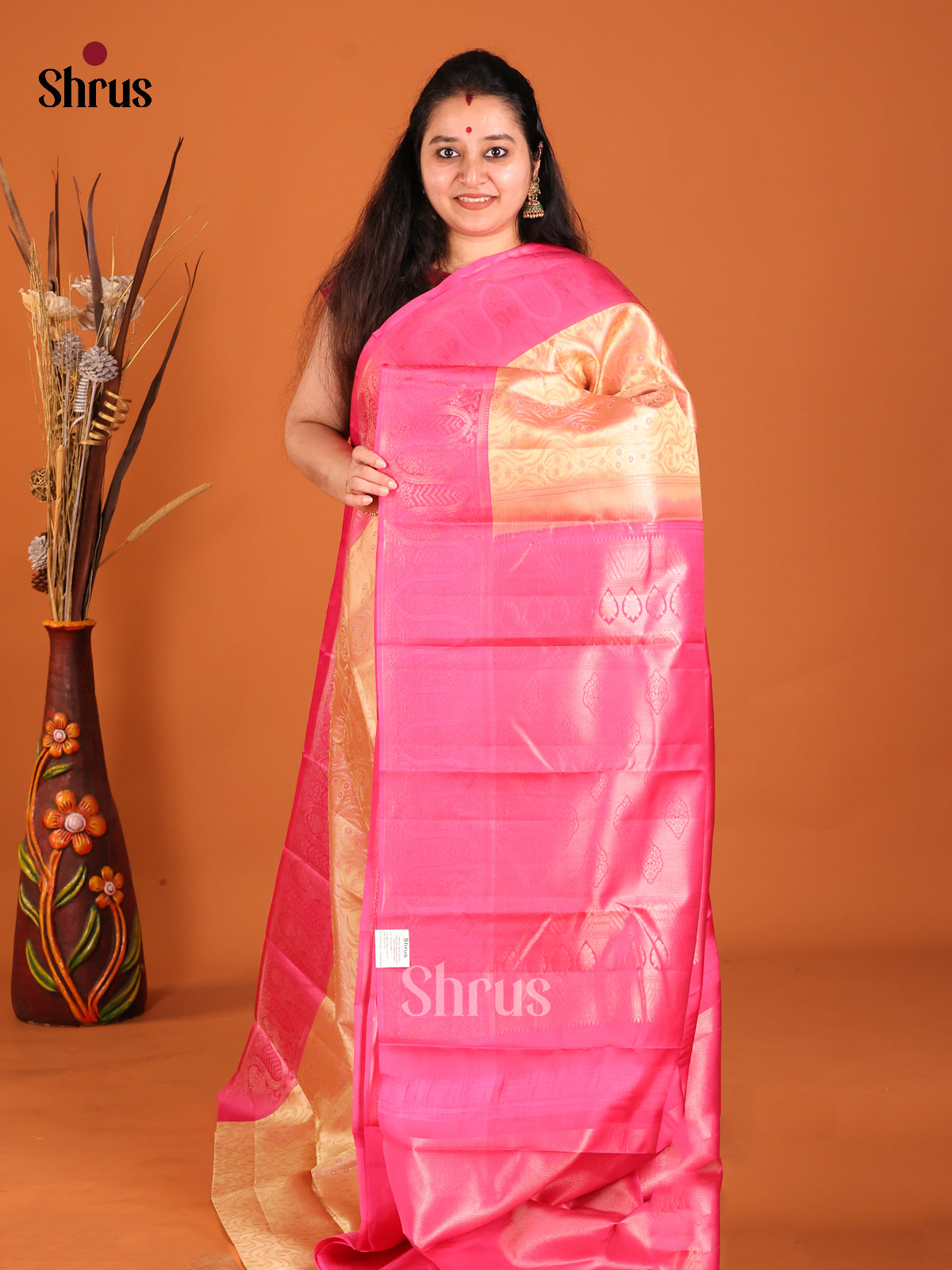 Pale Orange & Pink Kanchipuram silk zari with contrast brocade pallu 