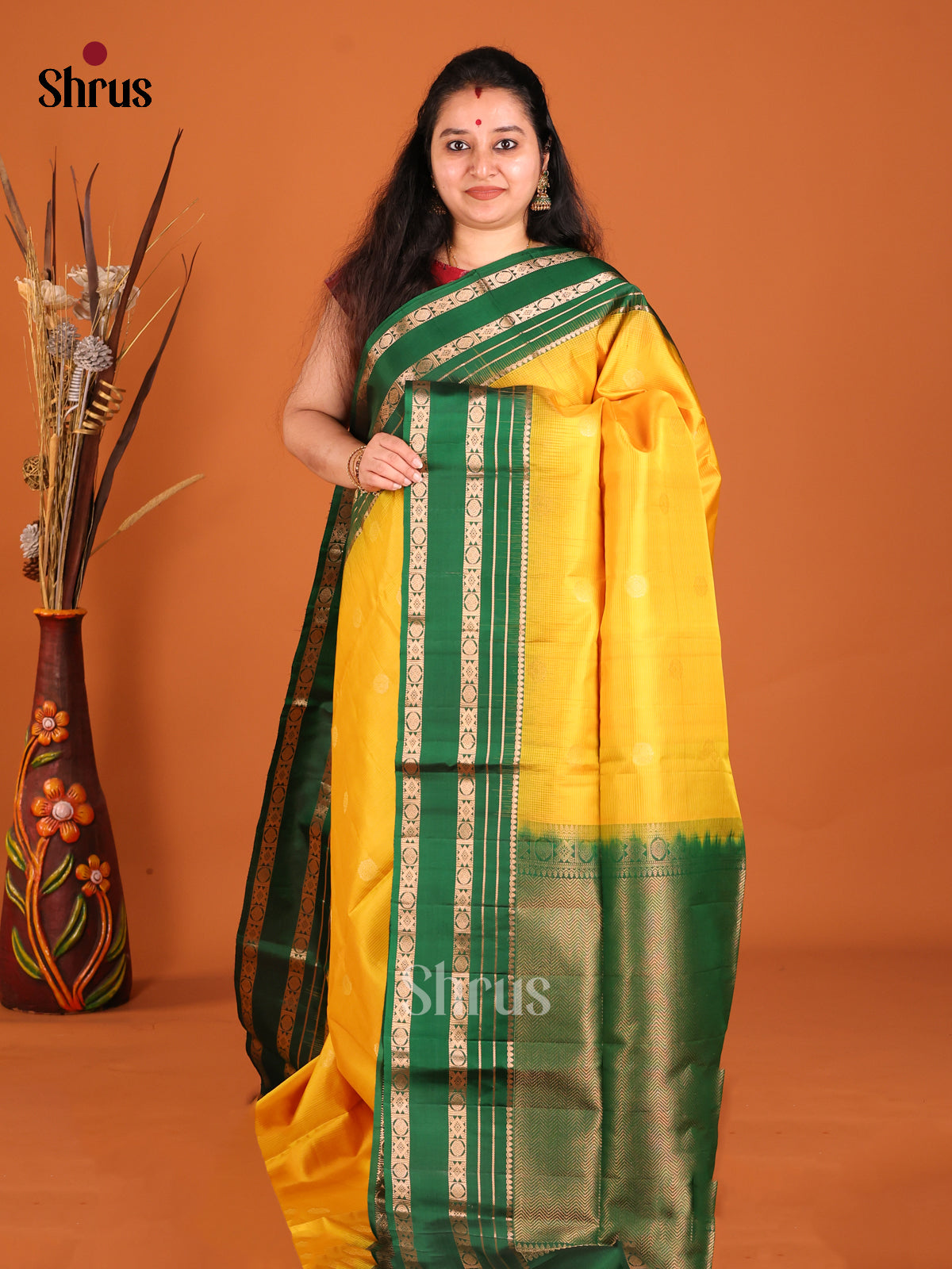 Radiant Yellow Soft Silk saree with Zari Buttas & Green rettaipet border - Shop on Shrus.com