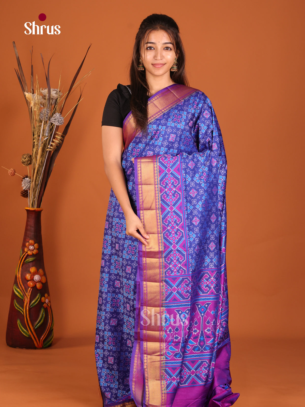 blue with purple and multi designed semi patola saree