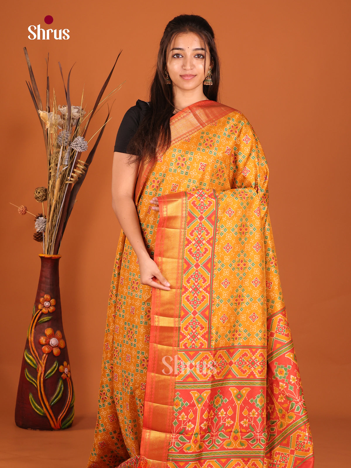 orange semi patola saree