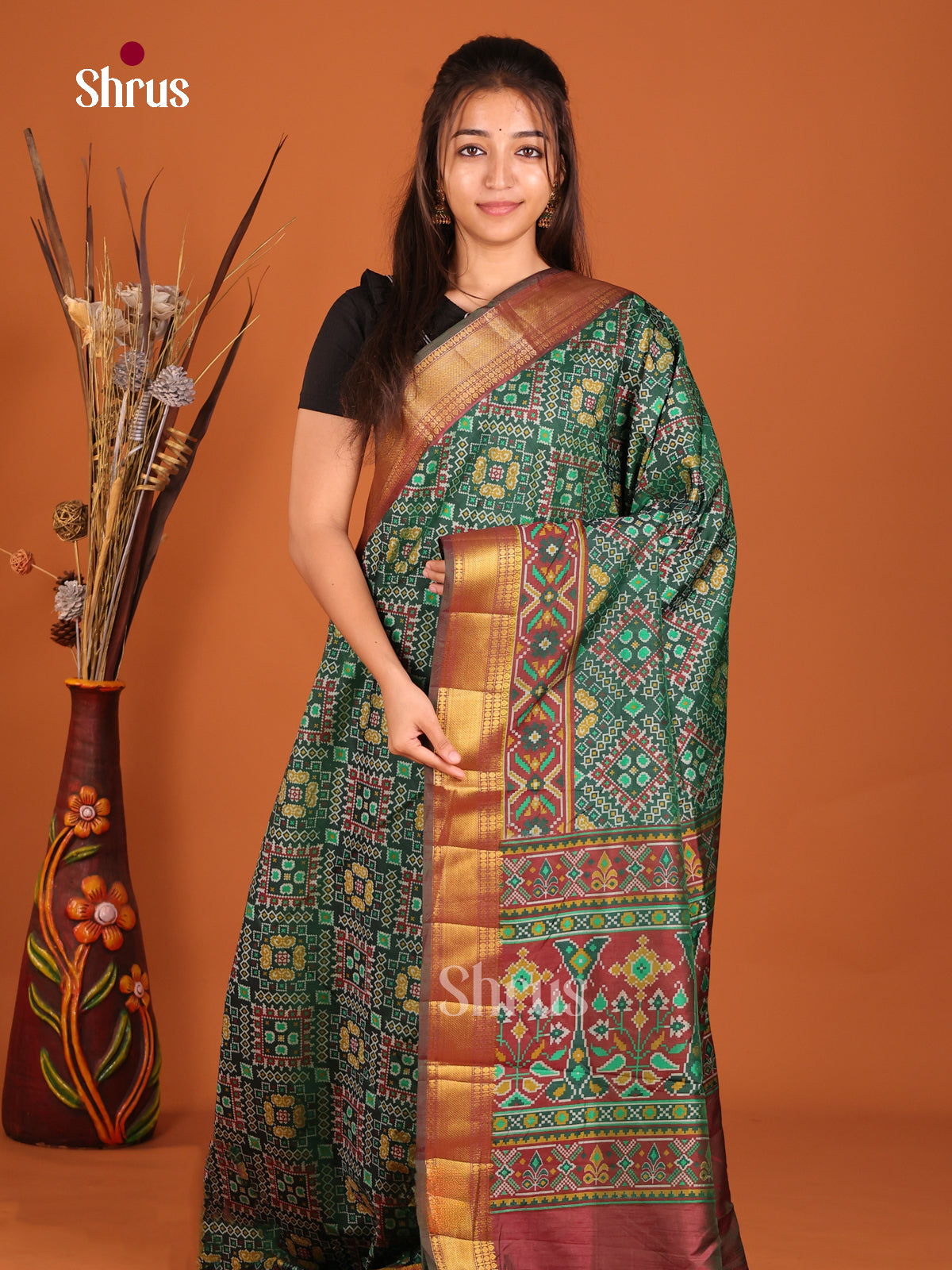 green brown yellow semi patola saree