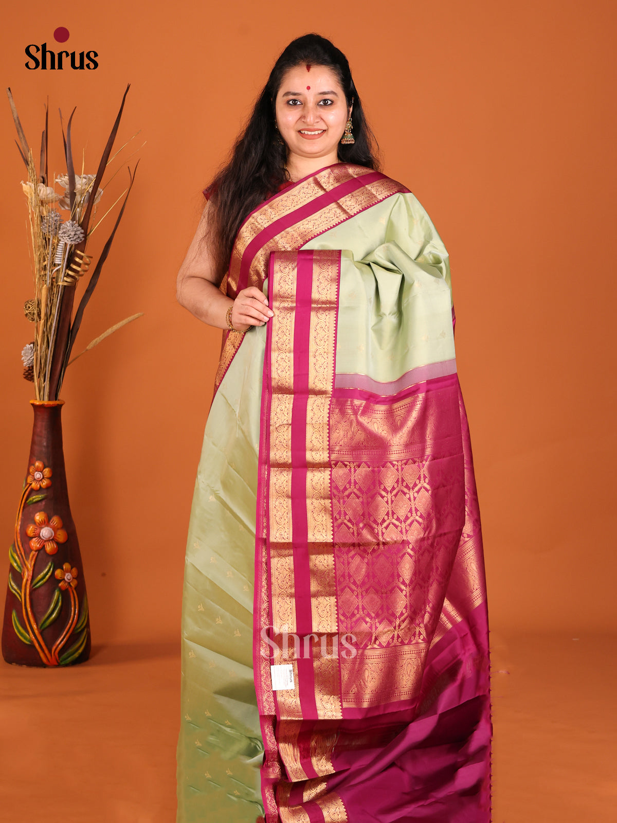cream and maroon Kanchipuram Butta design Saree