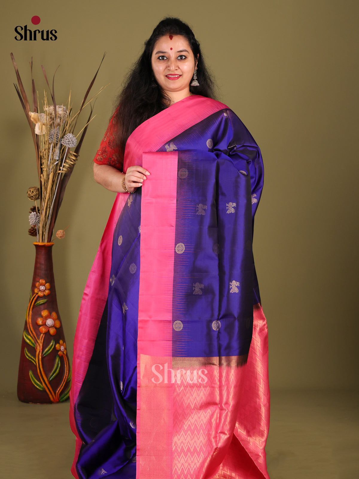 Blue & Pink Soft Silk Saree gleams with peacock , floral buttas
