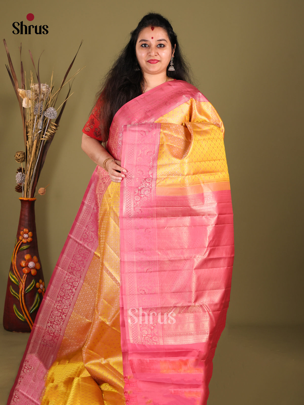 Timeless Yellow Kanchipuram silk Saree with intricate floral brocade & Maroon Border 