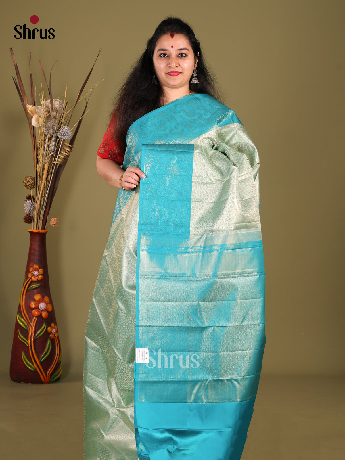 Exquisite Pastel Green Kanjivaram Silk Saree with Floral Brocade & Blue Zari Border 