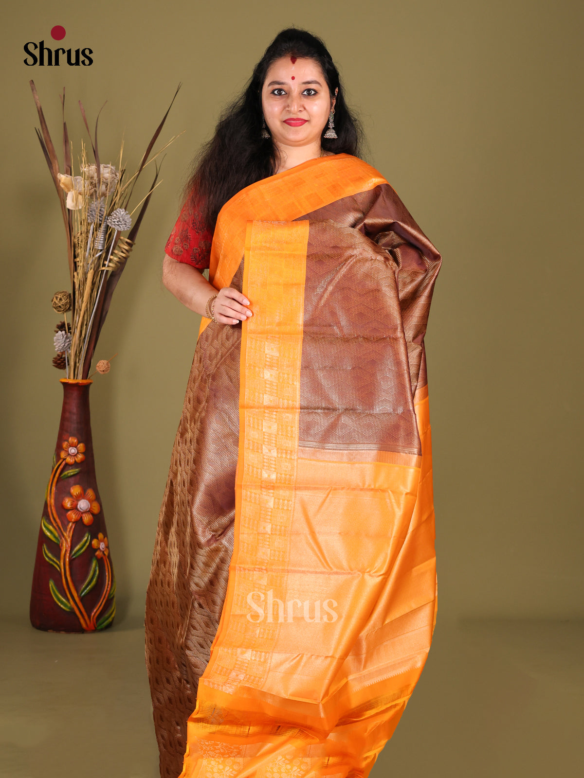 Classy Brown Kanjivaram silk Saree with golden brocade & Orange Border