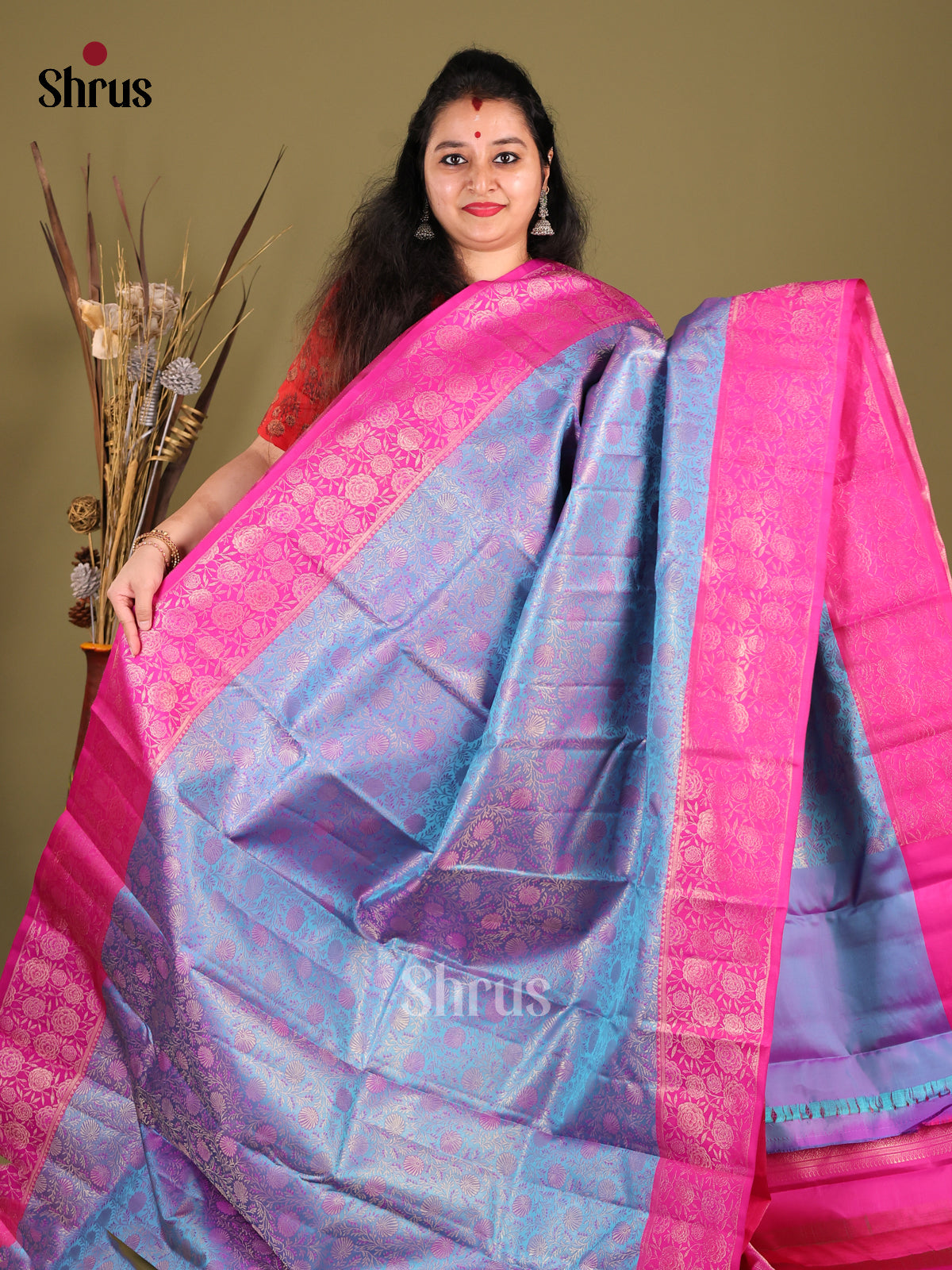 Vibrant Blue Kanjivaram silk Saree with floral nestling brocade & Pink Border -1