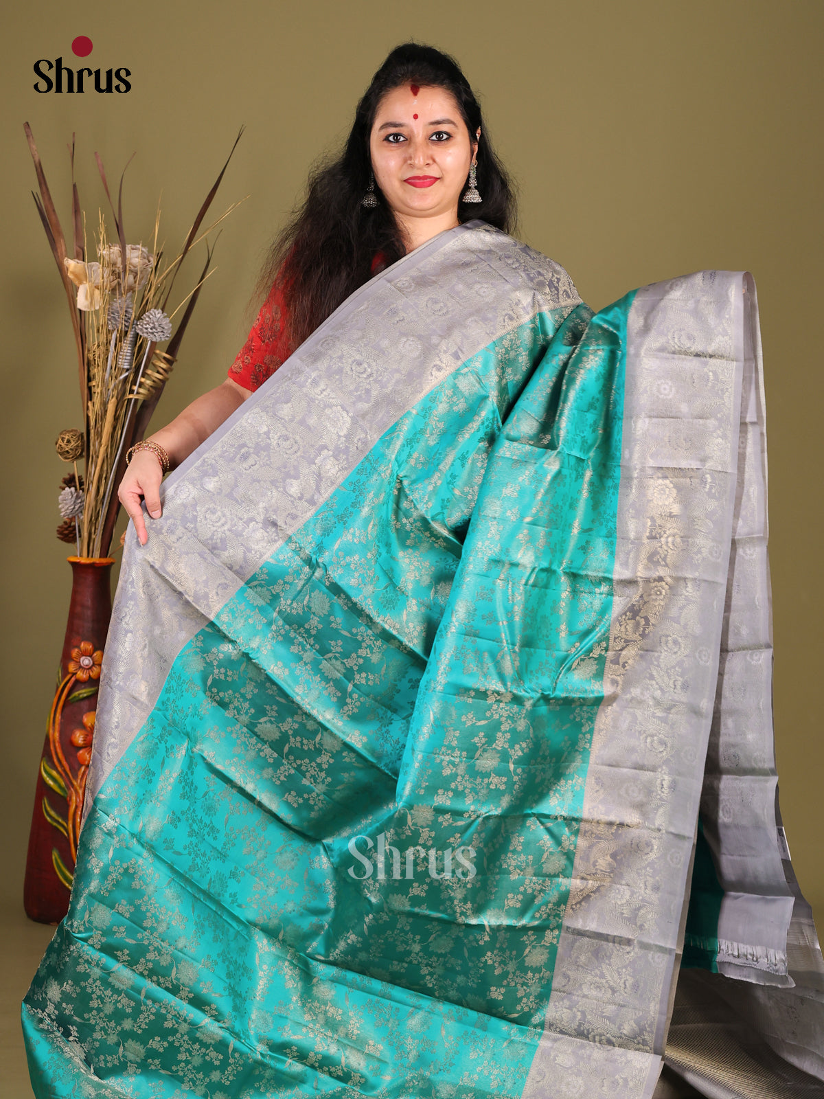 Radiant Sky Blue Kanjivaram silk Saree with floral nestling brocade & Grey Border 1