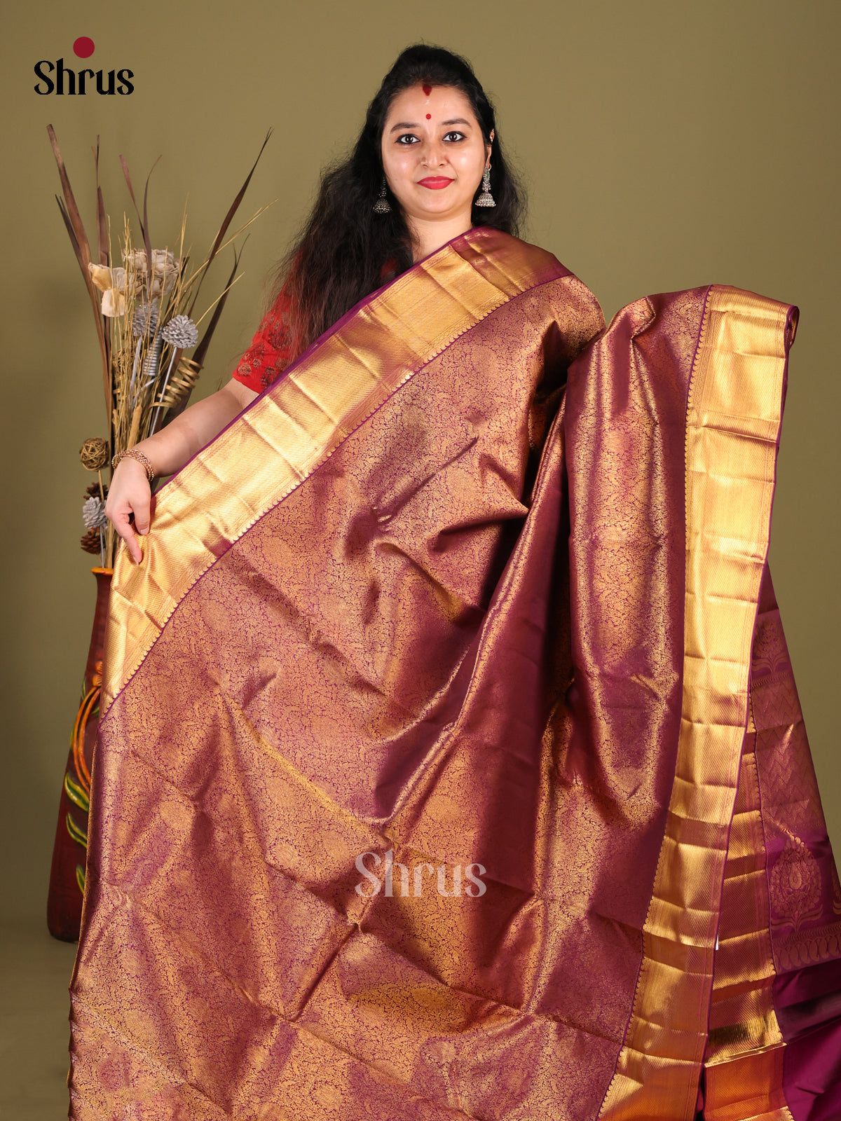 Exquisite Purple Kanchipuram silk Saree with floral nestling brocade & Zari Border -1