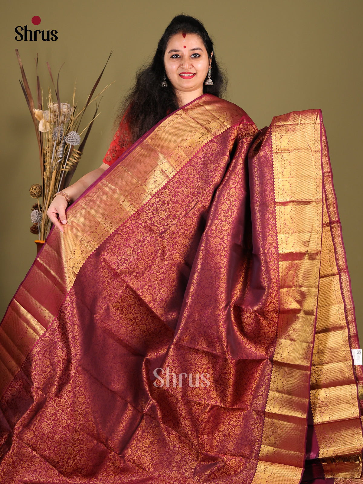 Elegant Maroon Kanjivaram Saree with zari woven floral nestling brocade -1
