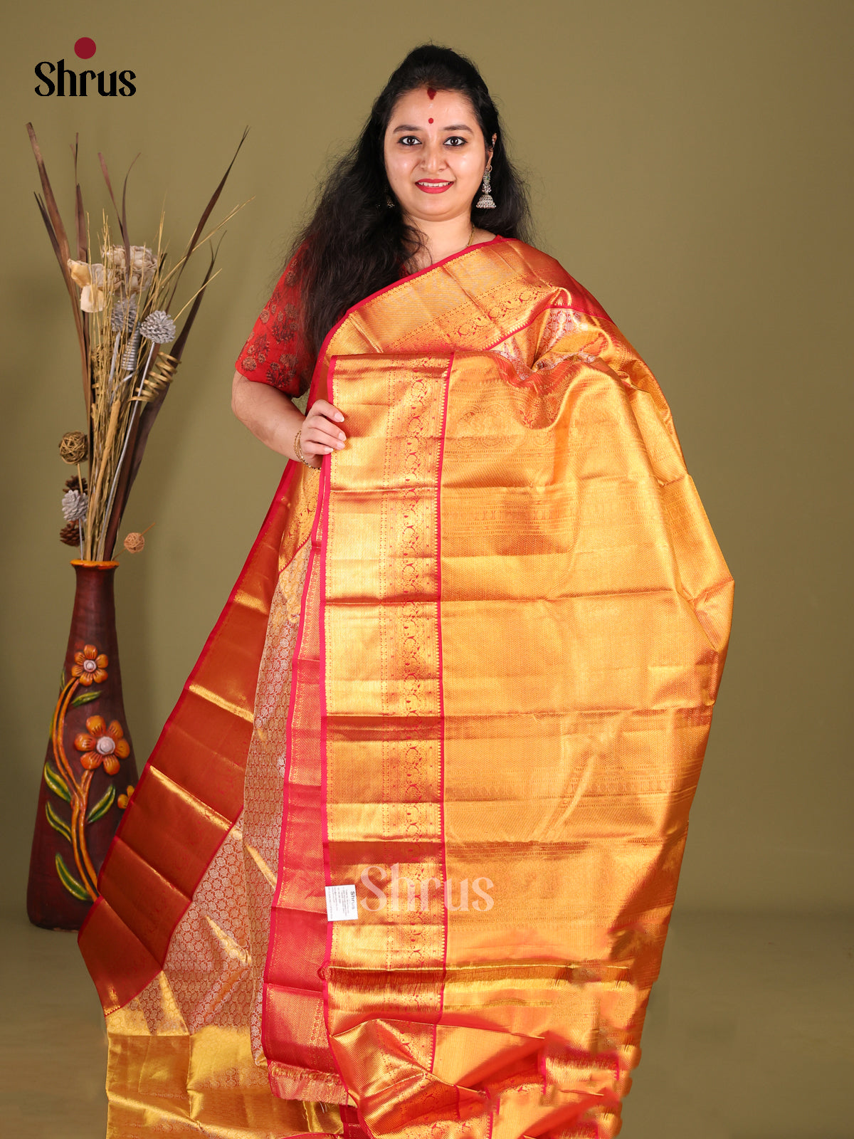Radiant Orange Kanchipuram Saree with Golden Brocade Weave & Red Zari Border