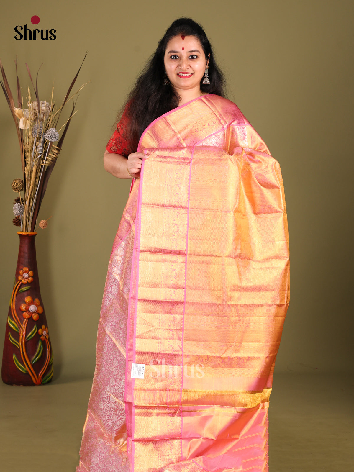 Shimmering Pink Kanjivaram Saree with zari floral nestling brocade - Shop on Shrus.com